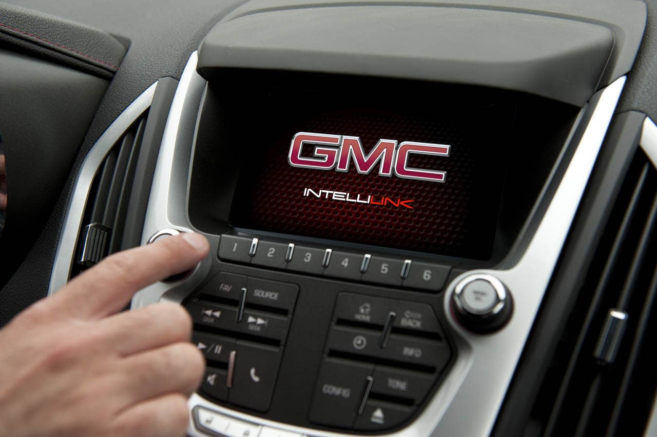 The 2012 GMC Terrain will be the first vehicle to offer GMC IntelliLink, which uses Bluetooth or USB to connect the drivers smartphone to Terrains new seven-inch, high-resolution, full-color touch screen display radio. IntelliLink allows smartphone control via voice activation and steering wheel-mounted controls, and streaming stereo audio from the phone through services like Pandora internet radio and Stitcher SmartRadio. Most importantly, IntelliLink enables seamless integration of stowed portable devices with Terrains infotainment system, allowing drivers to keep their hands on the wheel and eyes on the road. (GMC News Photo)