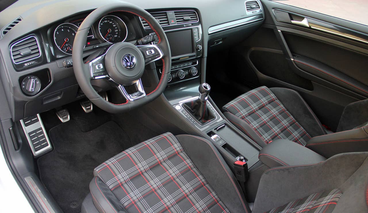 Sticker Price: $25,095 - $29,695 Invoice Price: $24,091 - $28,507 Fuel Economy: 21 mpg City, 31 mpg Highway  Volkswagens aren't just zippy and efficient, they can also be cushy to drive. The heated supportive sport seats in this hot hatch hug occupants through turns and are upholstered in a slick plaid. Inside, it's comfortable, with a businesslike cabin. It's nicely trimmed and well-assembled. The level of fit and finish better than you might expect for the price, especially since plenty of money was also spent on the engineering.  Research the Volkswagen GTI Volkswagen GTI Overview Volkswagen GTI Photos & Video Local Dealer Price Quote