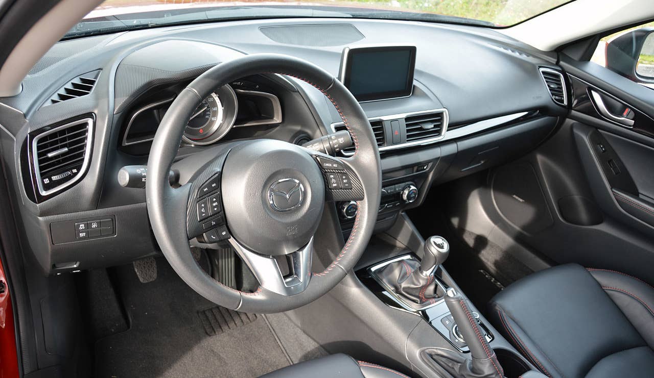Sticker Price: $16,945 - $26,495 Invoice Price: $16,464-$25,335 Fuel Economy: 29 mpg City, 41 mpg Highway  Mazdas are generally known as zippy cars with lackluster interiors. The new generation Mazda3 should change all of that. The chunky two-tier instrument panel of the outgoing 3 has been supplanted by one with a smoother, more cohesive look. Its new navigation system is displayed on a sizeable touchscreen, which allows users to navigate through the various screens like a smart phone. Passengers in the back will find less leg and head room than in the previous Mazda3, but those in the front seats will be set for a pleasant ride in cushier seats that offer everyday driving comfort.  Research the Mazda3 Mazda3 Overview Mazda3 Photos & Video Local Dealer Price Quote