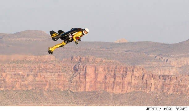 Jetman Yves Rossy flys his jetwing over the Grand Canyon.