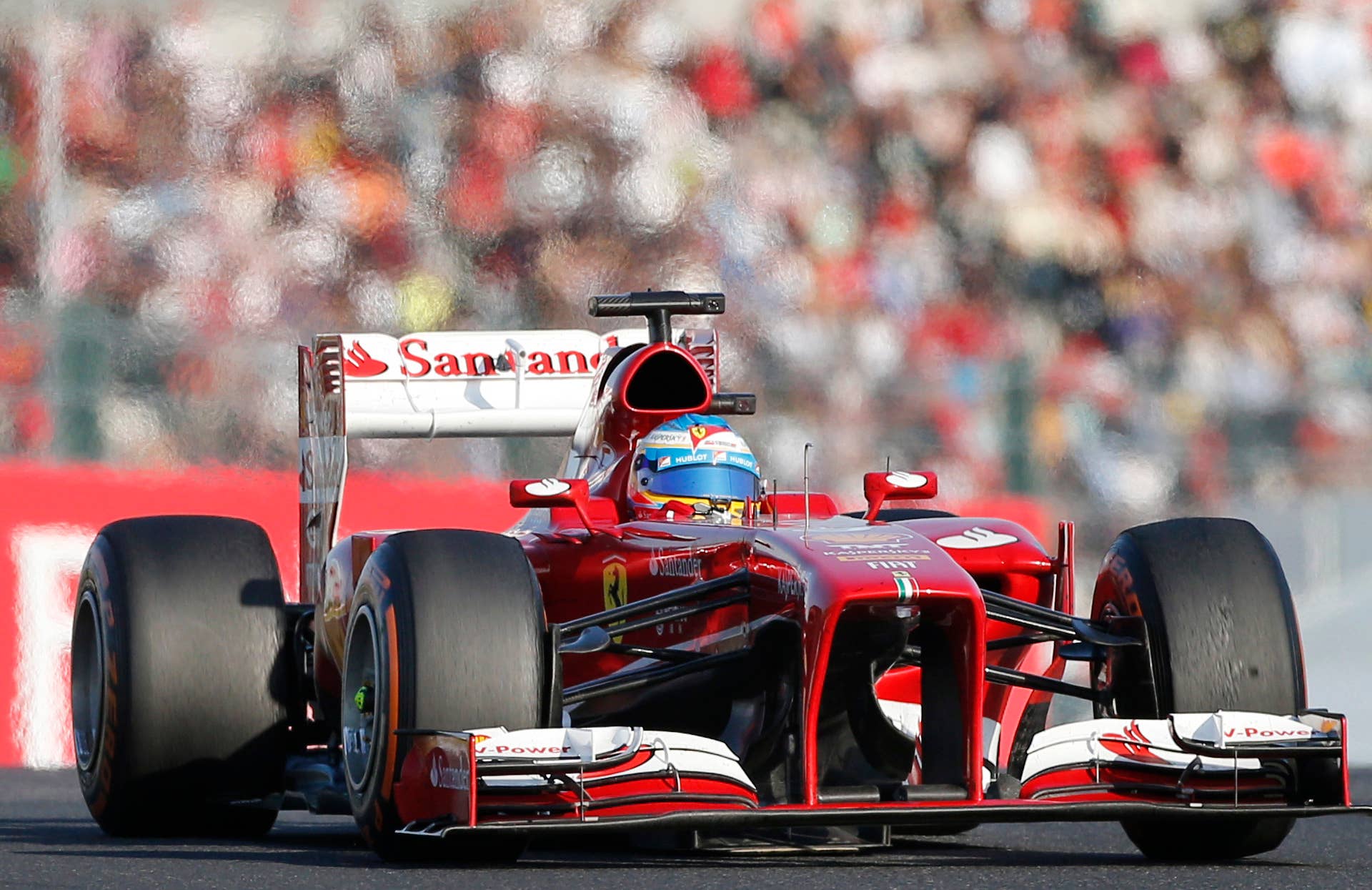 Ferrari driver Fernando Alonso of Spain steers his car during the Japanese Formula One Grand Prix at the Suzuka circuit in Suzuka, Japan, Sunday, Oct. 13, 2013.(AP Photo/Koji Sasahara)