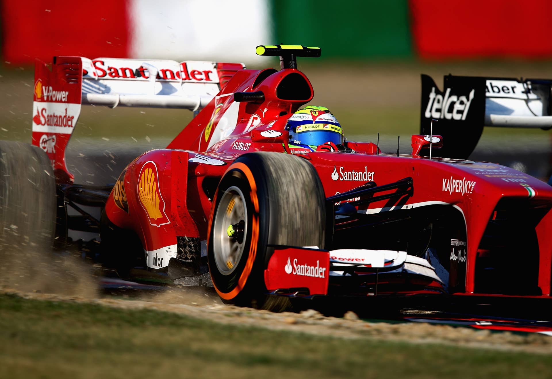 SUZUKA, JAPAN - OCTOBER 13:  Felipe Massa of Brazil and Ferrari drives during the Japanese Formula One Grand Prix at Suzuka Circuit on October 13, 2013 in Suzuka, Japan.  (Photo by Clive Mason/Getty Images)