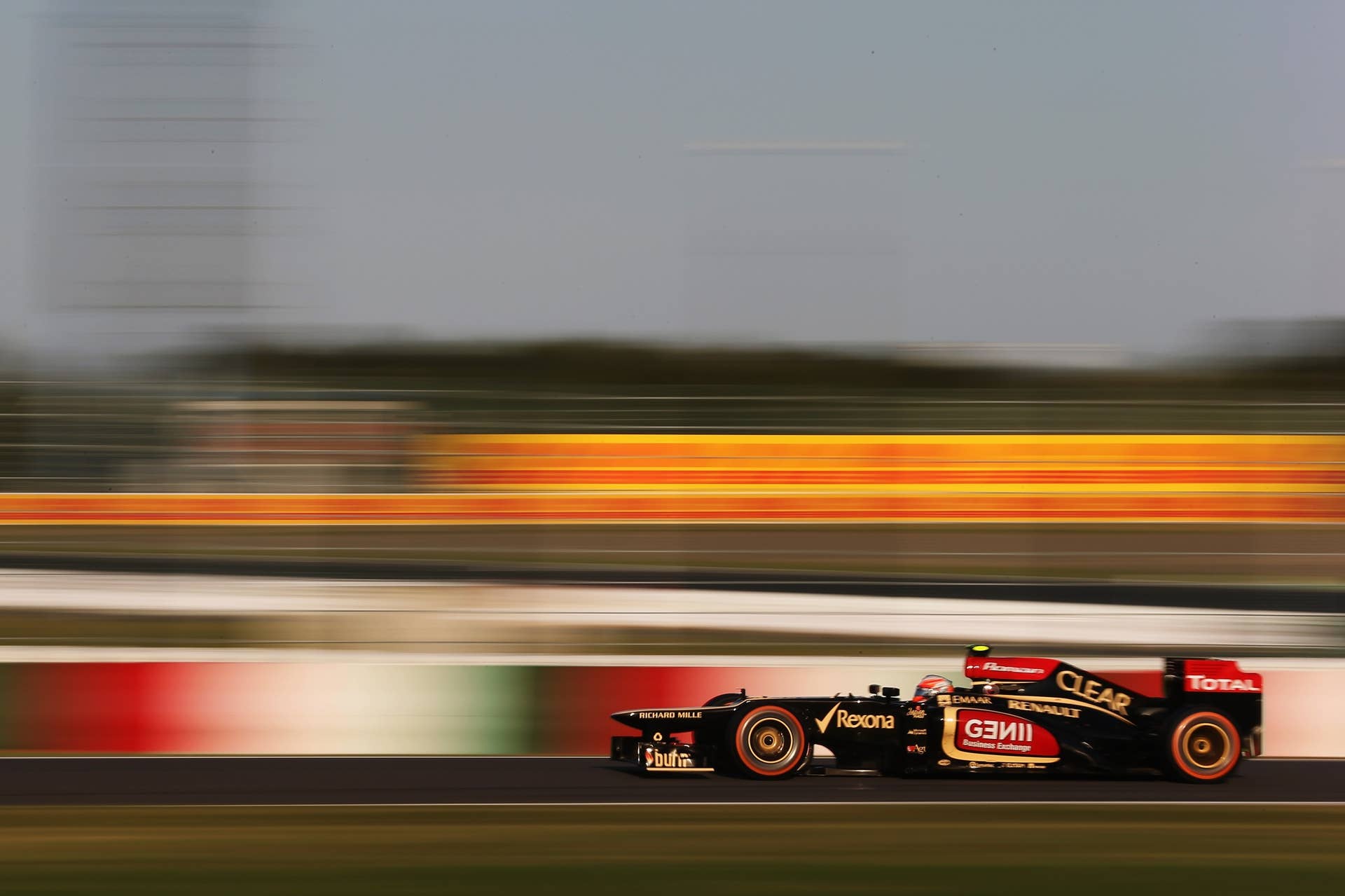 SUZUKA, JAPAN - OCTOBER 13:  Romain Grosjean of France and Lotus drives on his way to finishing third during the Japanese Formula One Grand Prix at Suzuka Circuit on October 13, 2013 in Suzuka, Japan.  (Photo by Mark Thompson/Getty Images)