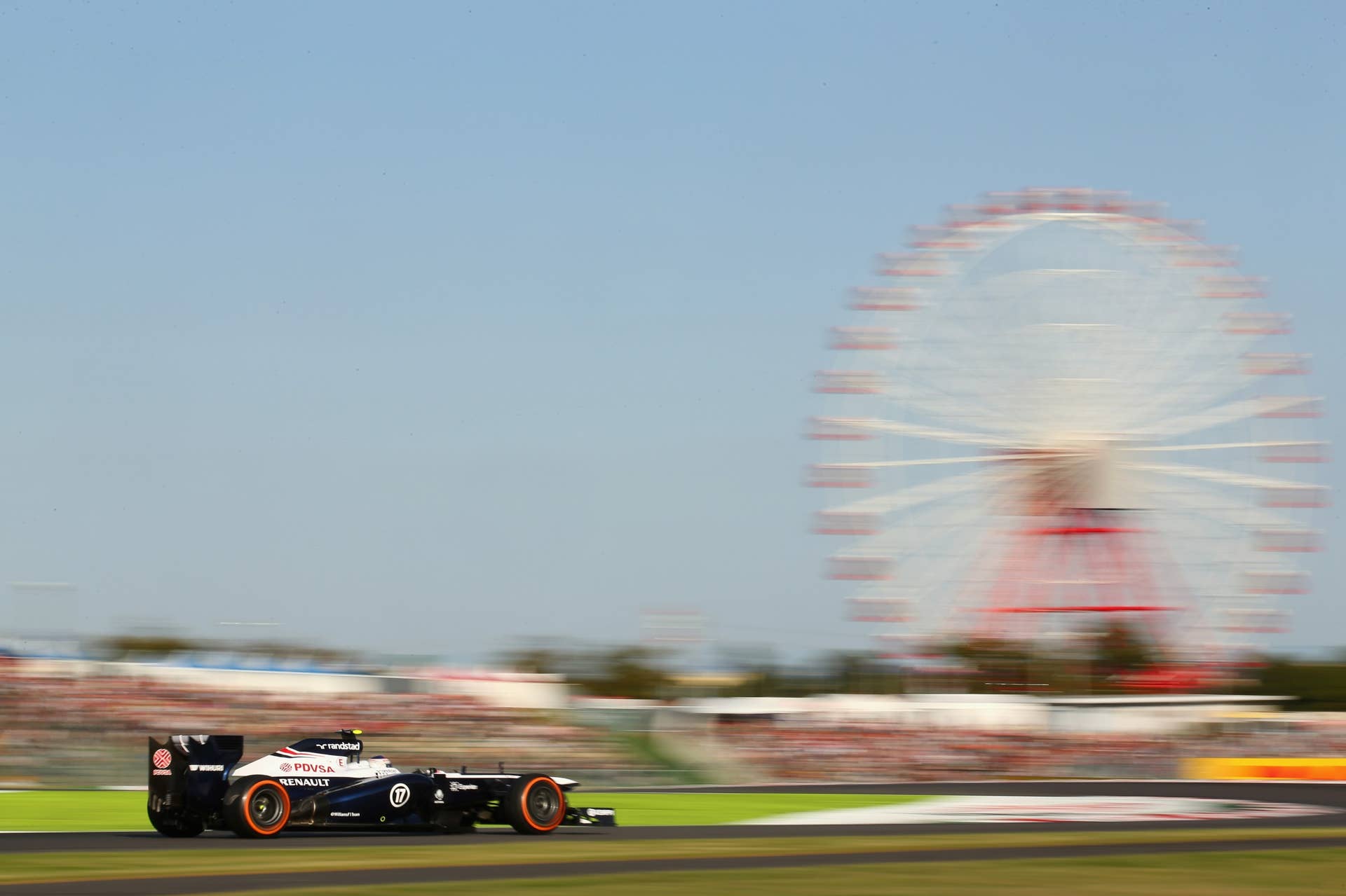 SUZUKA, JAPAN - OCTOBER 13:  Valtteri Bottas of Finland and Williams drives during the Japanese Formula One Grand Prix at Suzuka Circuit on October 13, 2013 in Suzuka, Japan.  (Photo by Clive Rose/Getty Images)
