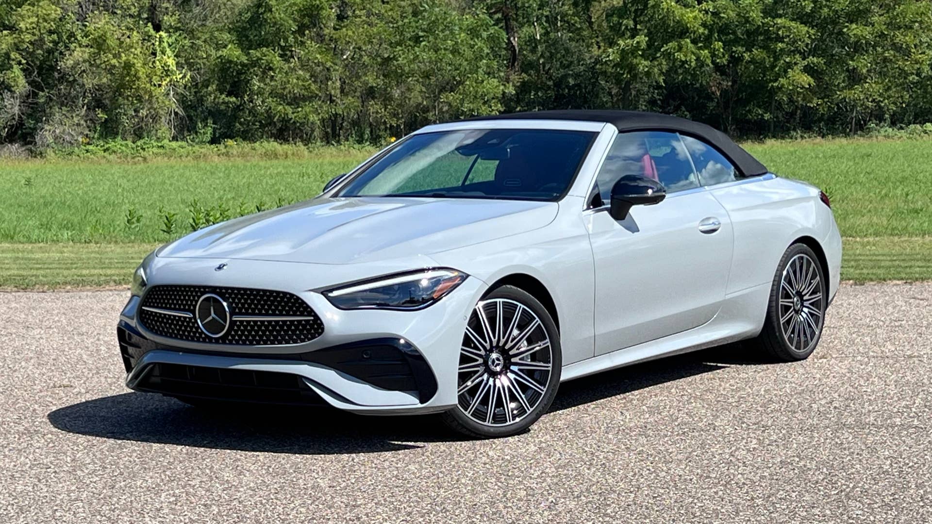 2024-2026 Mercedes-Benz CLE 450 Cabriolet in Cirrus Silver top up front angled view