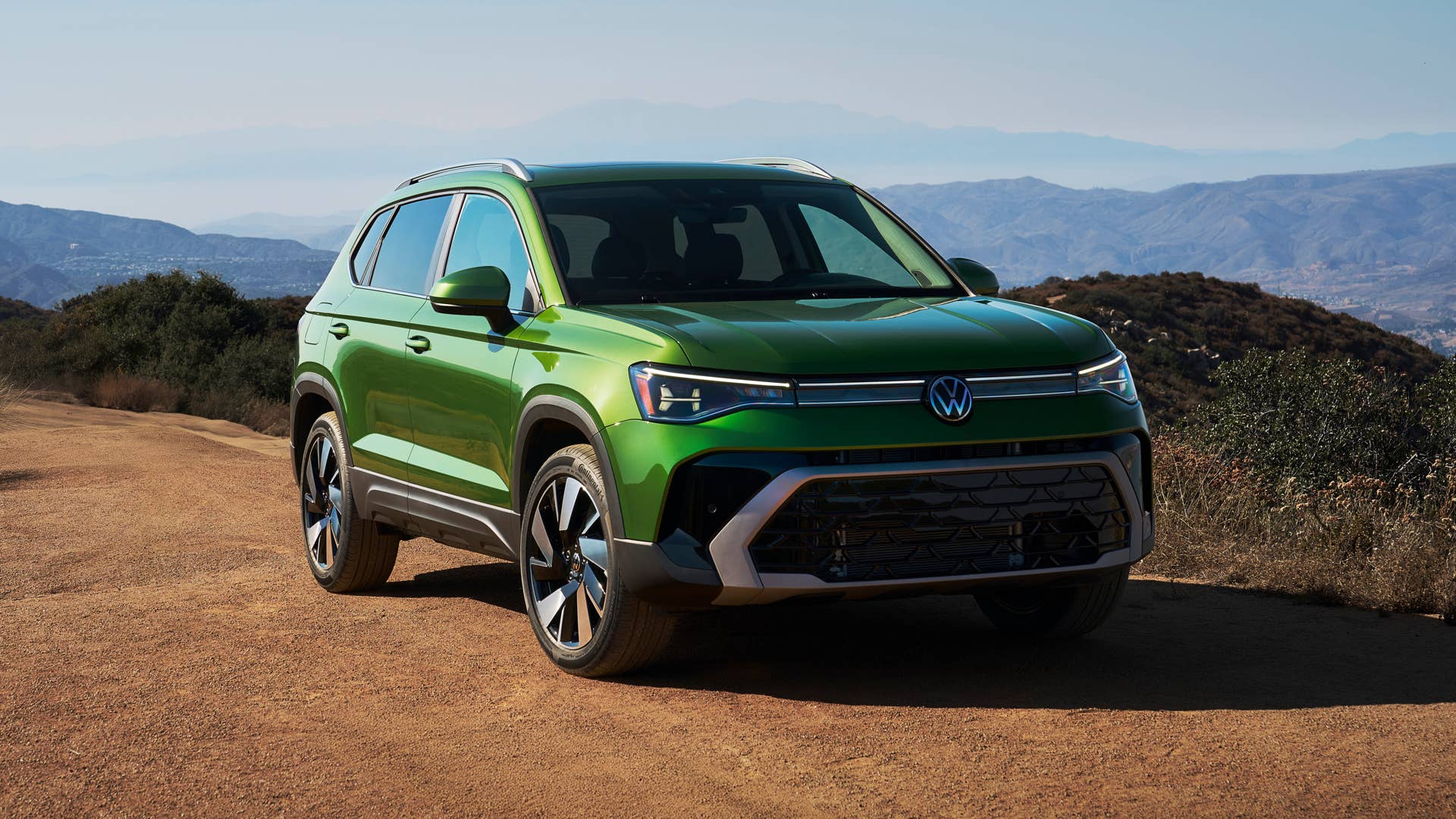 2025-2026 Volkswagen Taos in Bright Moss Green front angled view