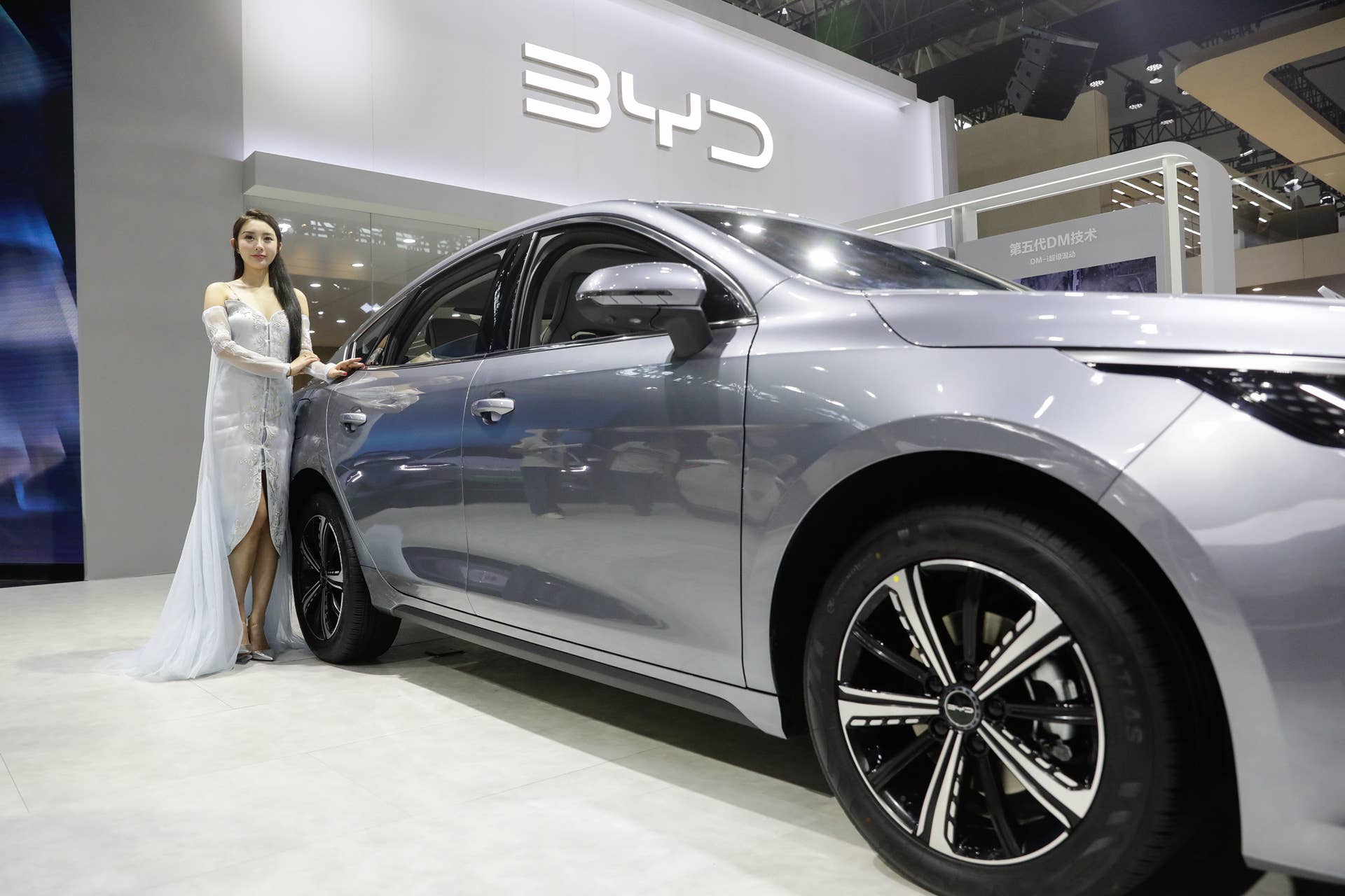 WUHAN, CHINA - SEPTEMBER 14: A model poses at BYD during 2024 Wuhan International Auto Show on September 14, 2024 in Wuhan, Hubei Province, China. More than 100 brands took part in the 2024 Wuhan International Auto Show which started on Saturday. (Photo by Wang HE/Getty Images)