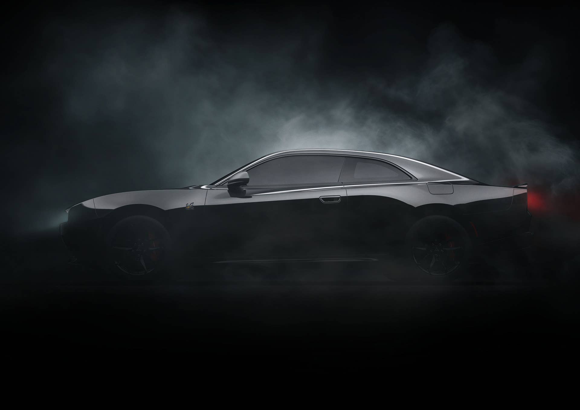 Silhouette of the new Dodge Charger EV with smoke rising from it