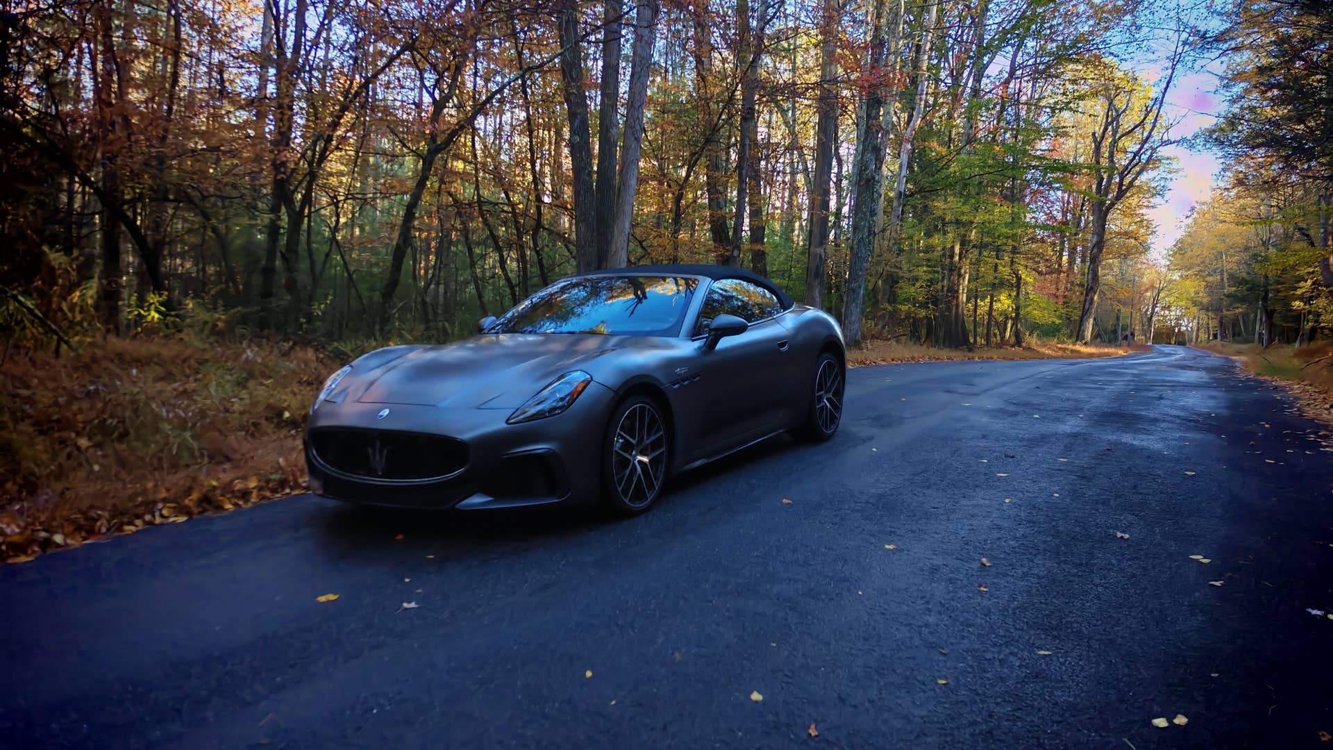 Maserati GranCabrio Trofeo on a backroad in autumn