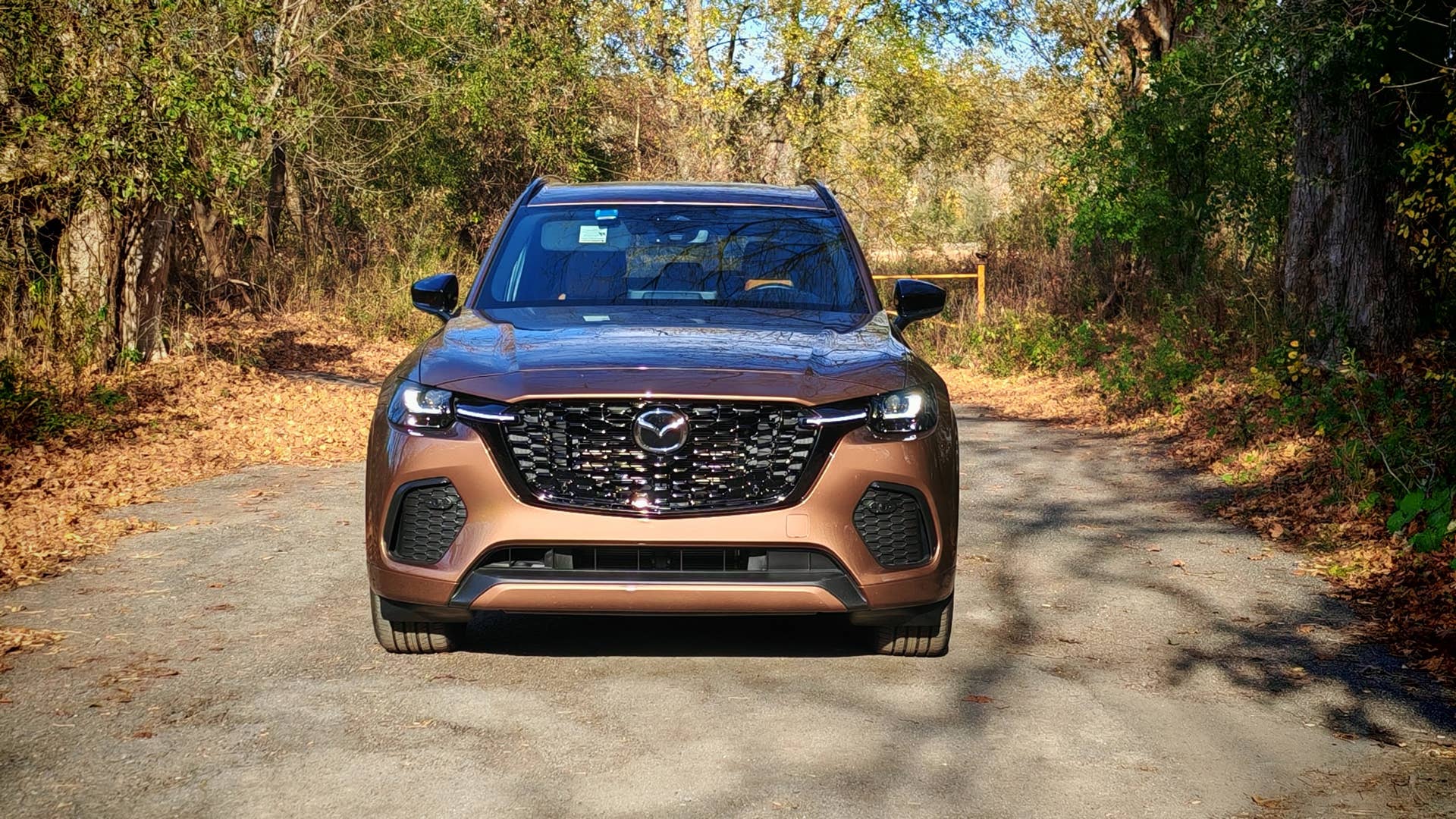 Front view of a copper colored 2025 Mazda CX-70
