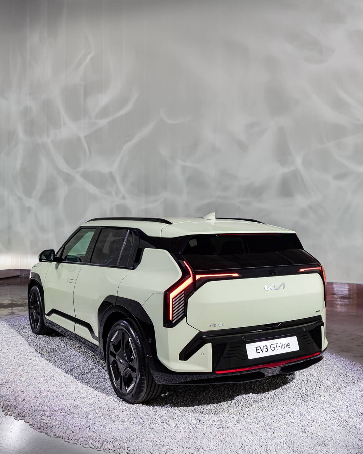 2027 Kia EV3 white rear angled view