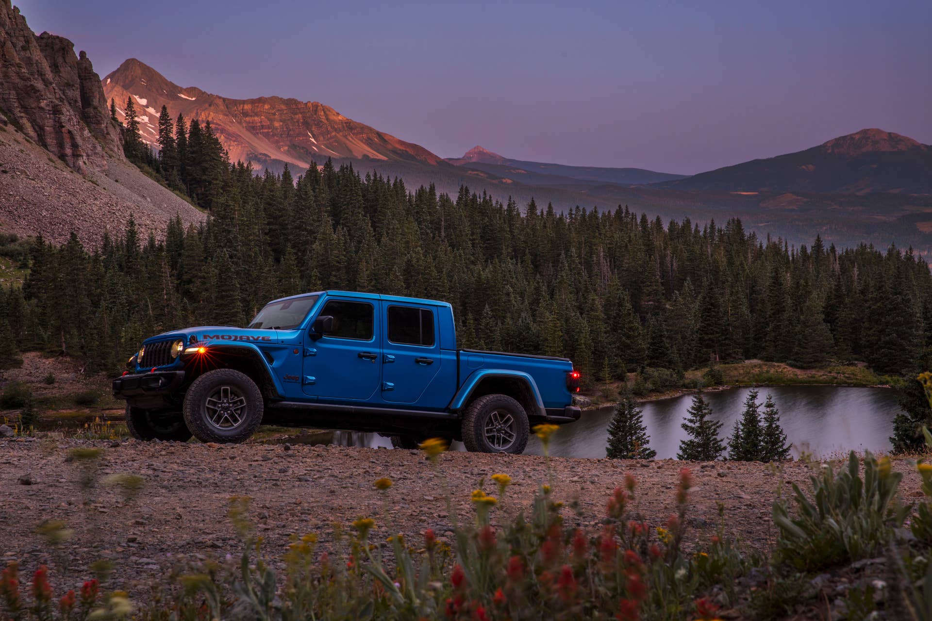 2025 Jeep Gladiator blue side view off-road