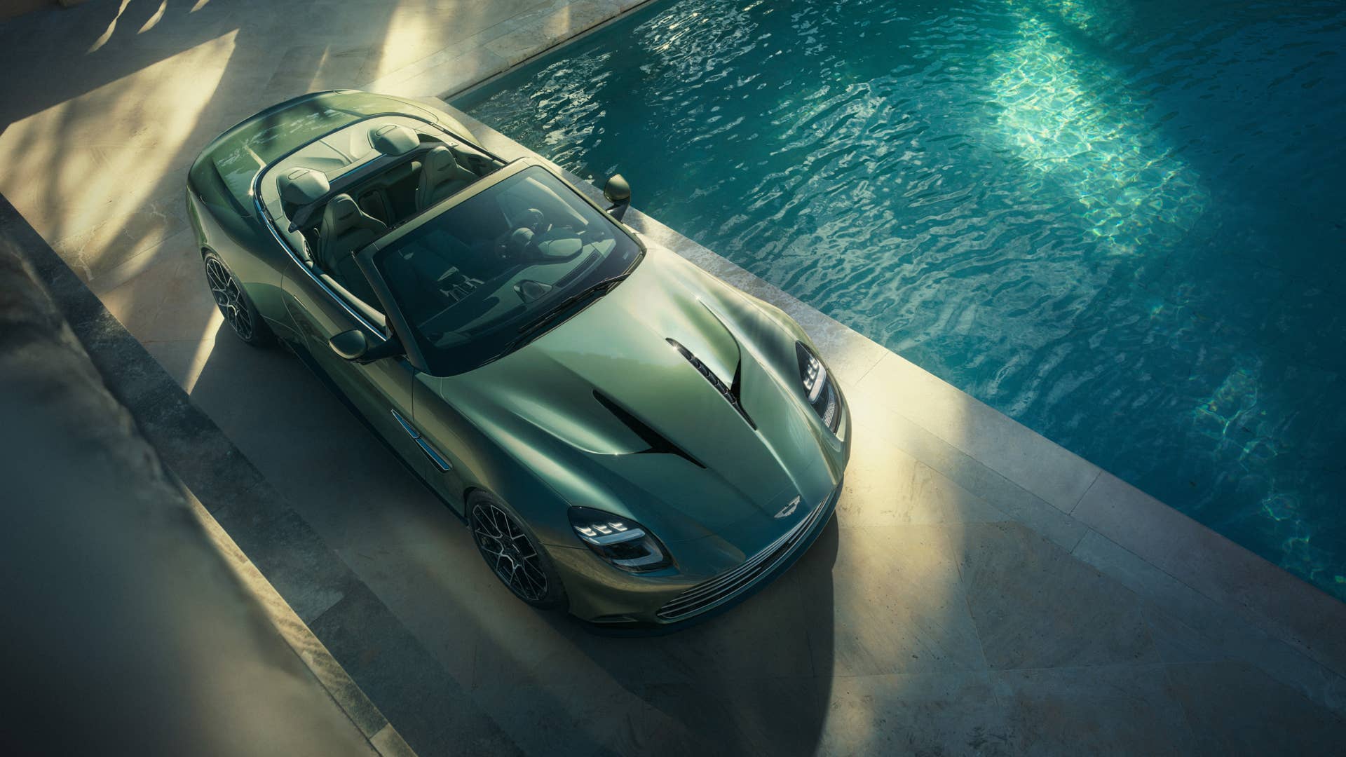 2026 Aston Martin Vanquish Volante green overhead front angled view