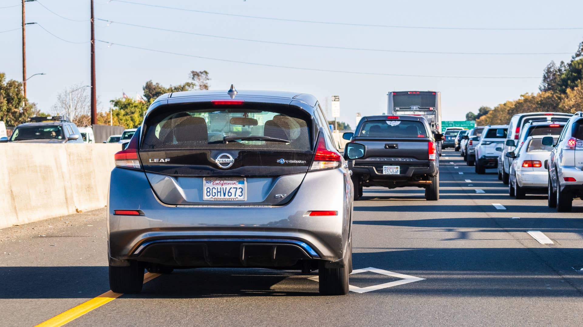A Nissan Leaf driving in a California HOV lane