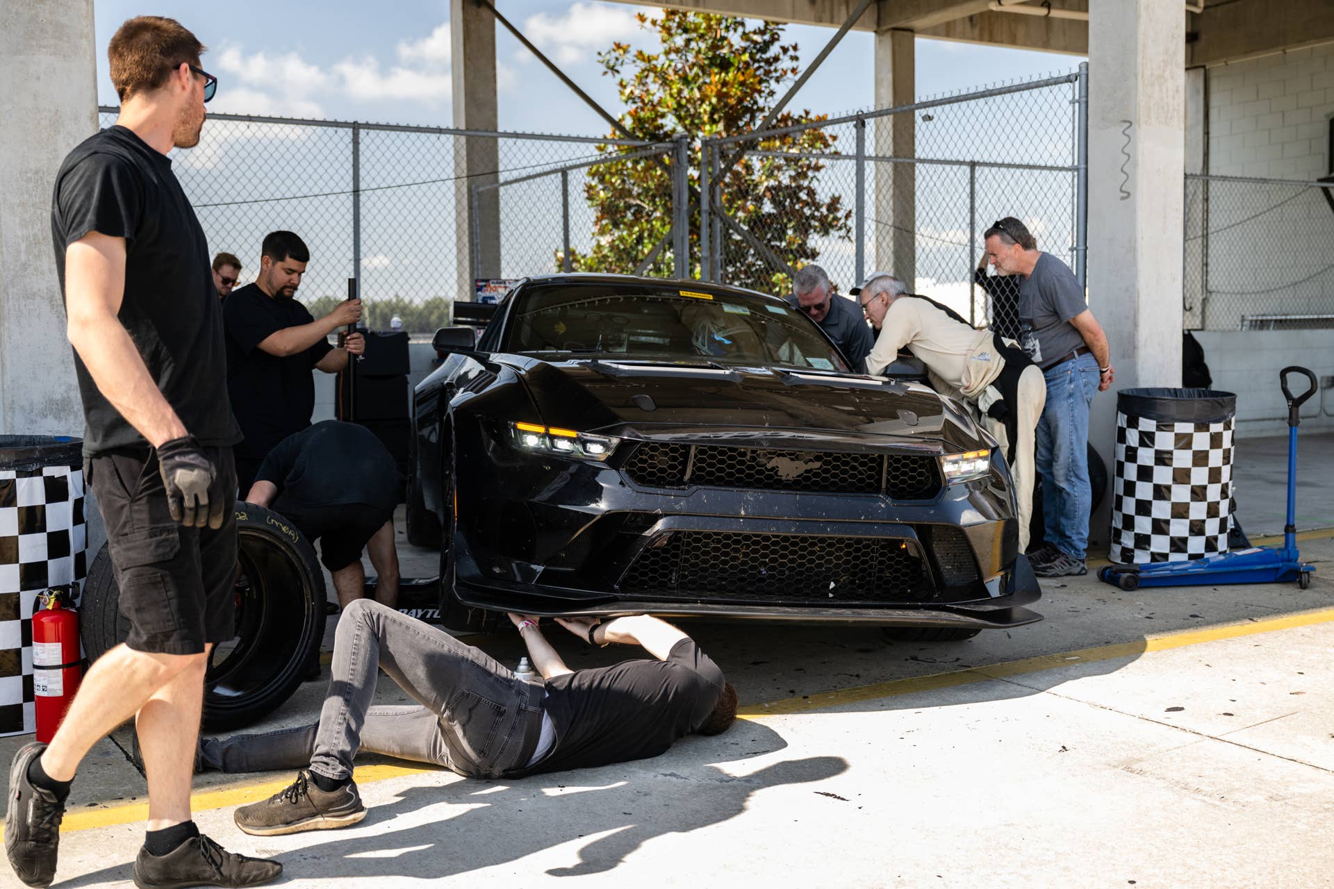 Ford's Racing Team making adjustments to the Mustang GTD in August 2024.