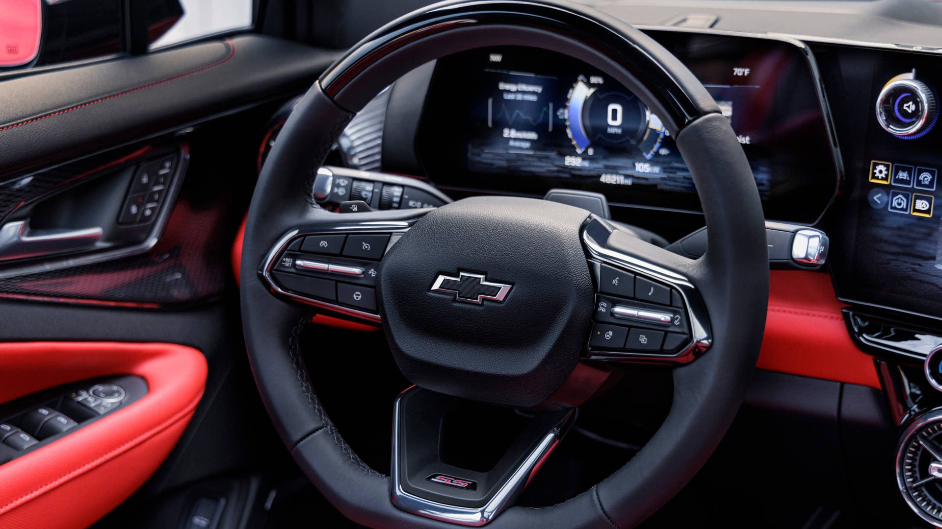Front view of steering wheel on 2024 Chevrolet Balzer EV SS in Radiant Red Tintcoat with Adrenaline Red interior. Preproduction model shown. Actual production model may vary. 2024 Chevrolet Blazer EV available Spring 2023.