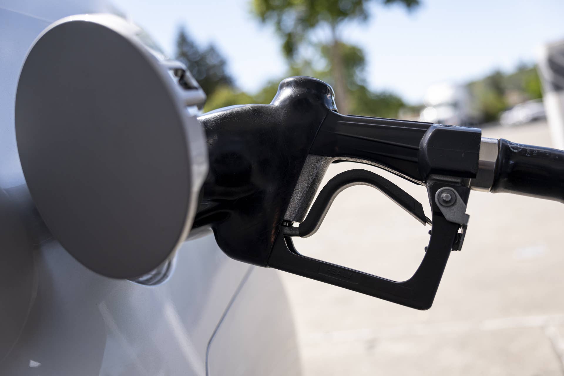 A fuel nozzle in a car at a Chevron gas station in Pinole, California
