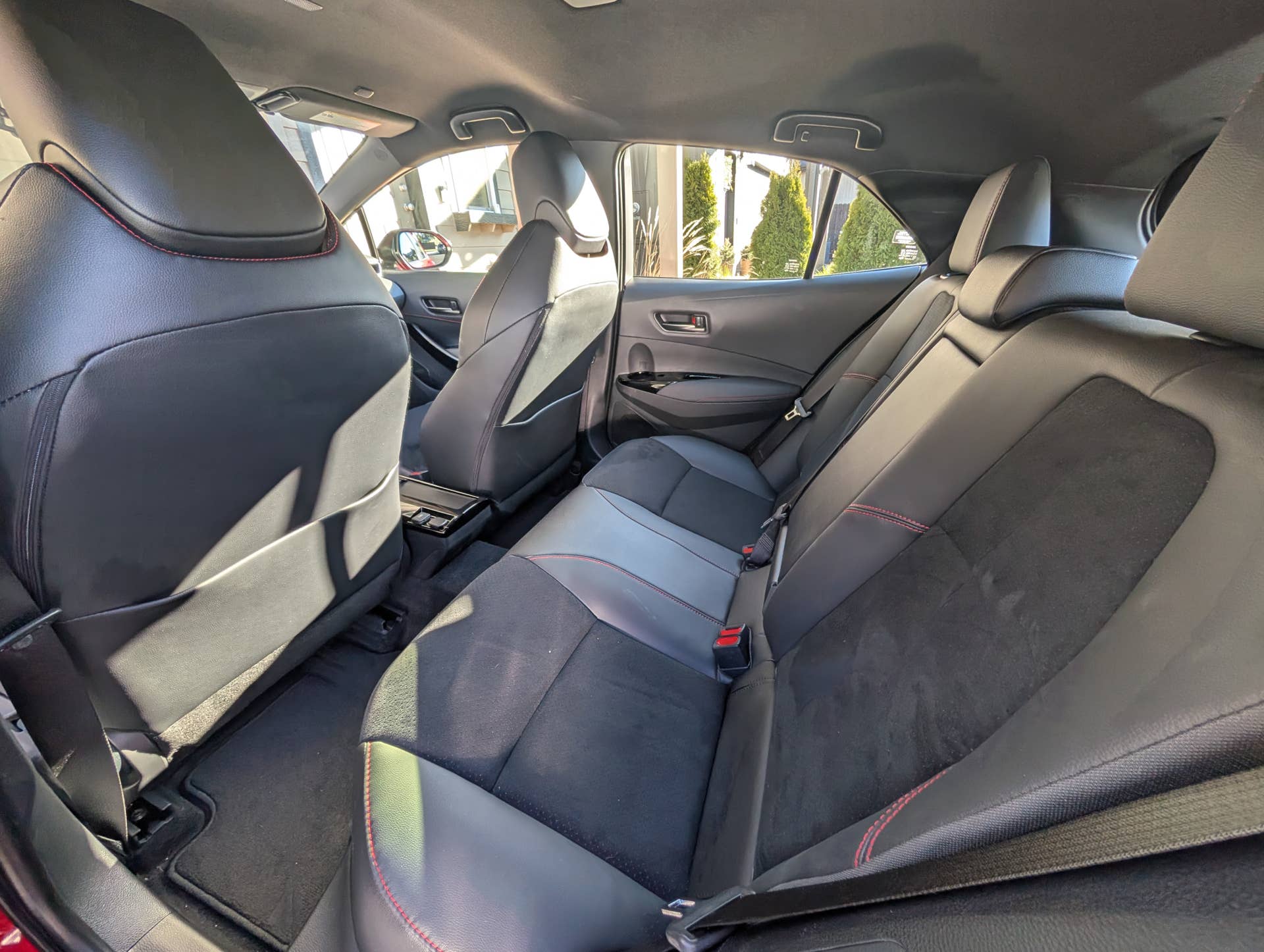The interior of the 2025 Toyota Corolla GR from the rear seats