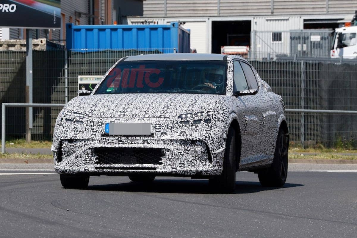 Genesis GV60 Magma Spy Shot front quarter left