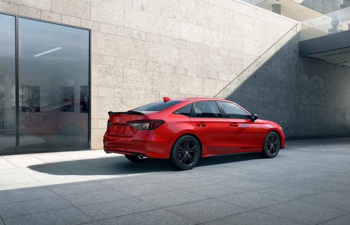 2025 Civic Si rear/side view, Rallye Red