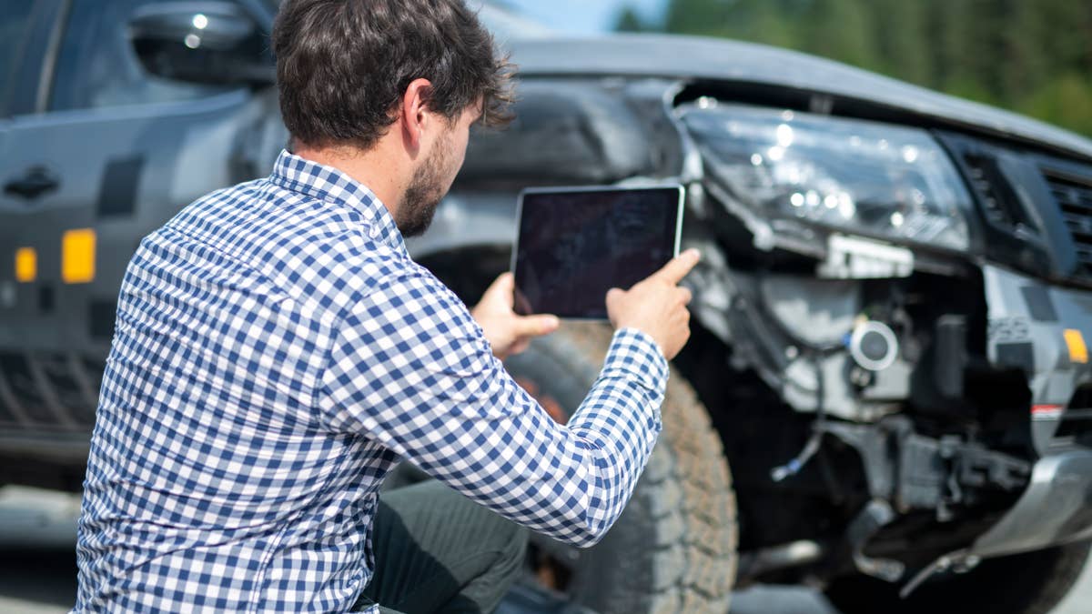 insurance-adjuster-inspecting-a-car.jpg?profile=rss&x=50&y=50