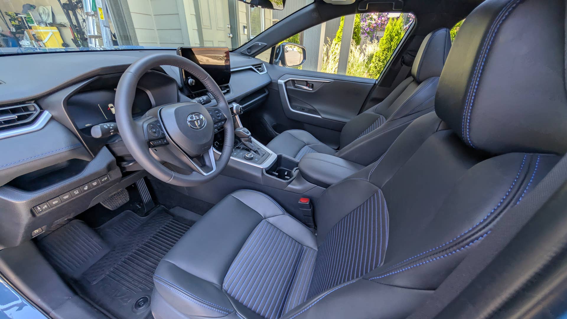 The interior of the 2025 Toyota RAV4 XSE AWD Hybrid