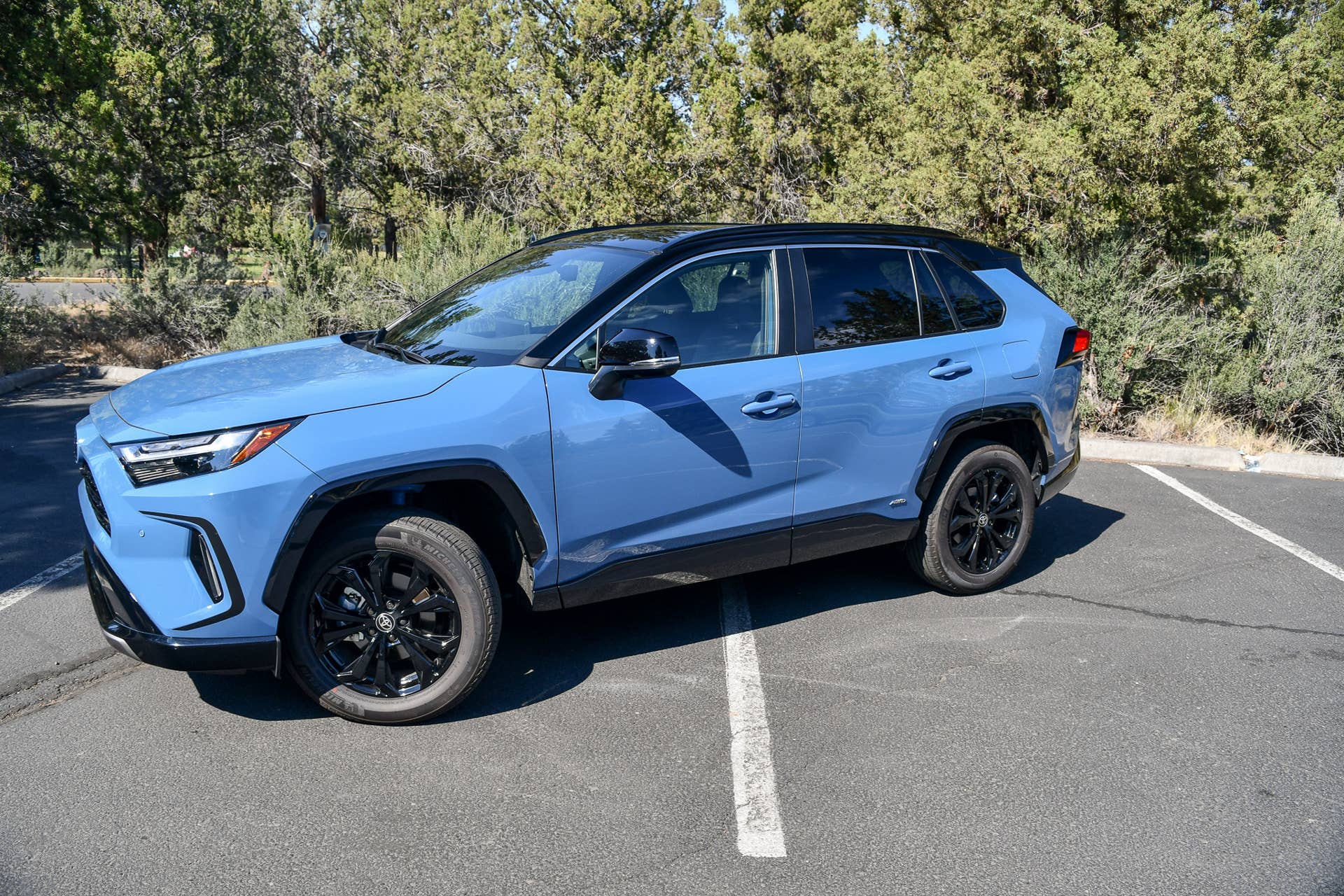 2025 Toyota RAV4 XSE AWD hybrid in Calgary Blue