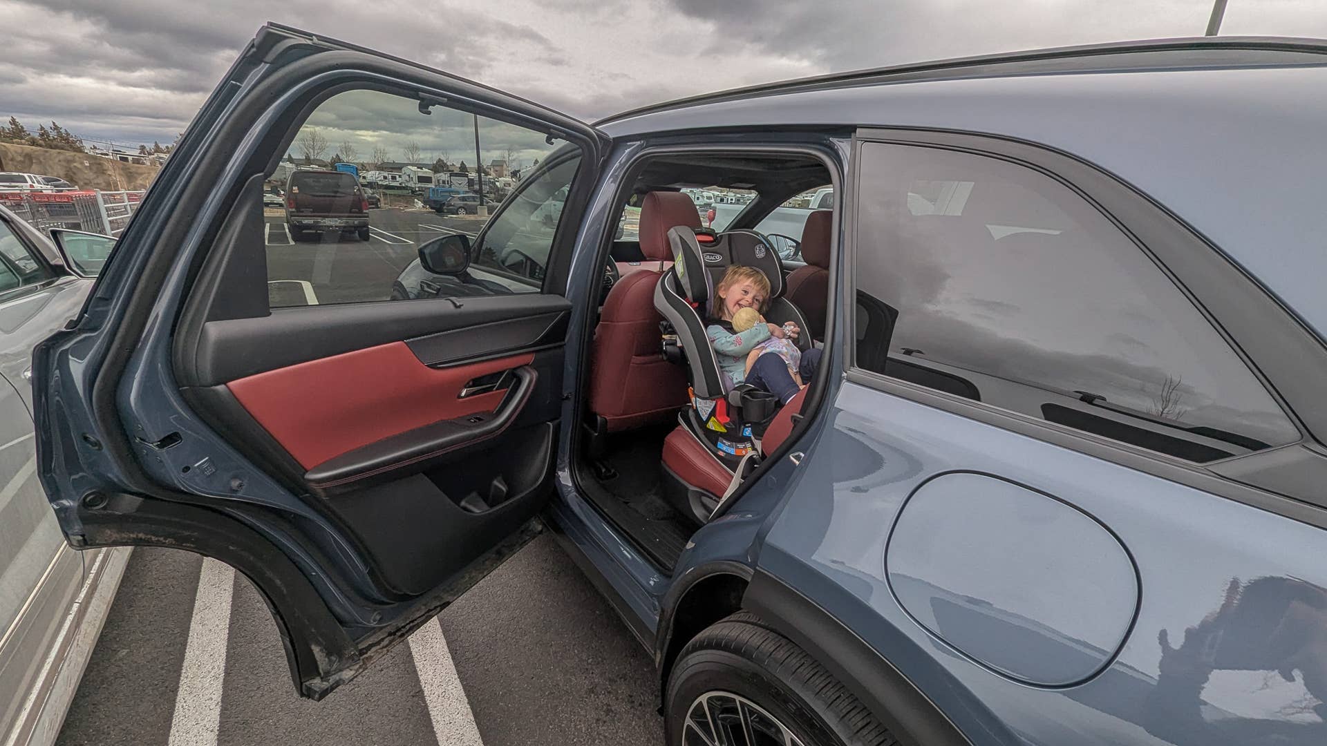 The large, wide doors of the Mazda CX-70 PHEV Premium Plus