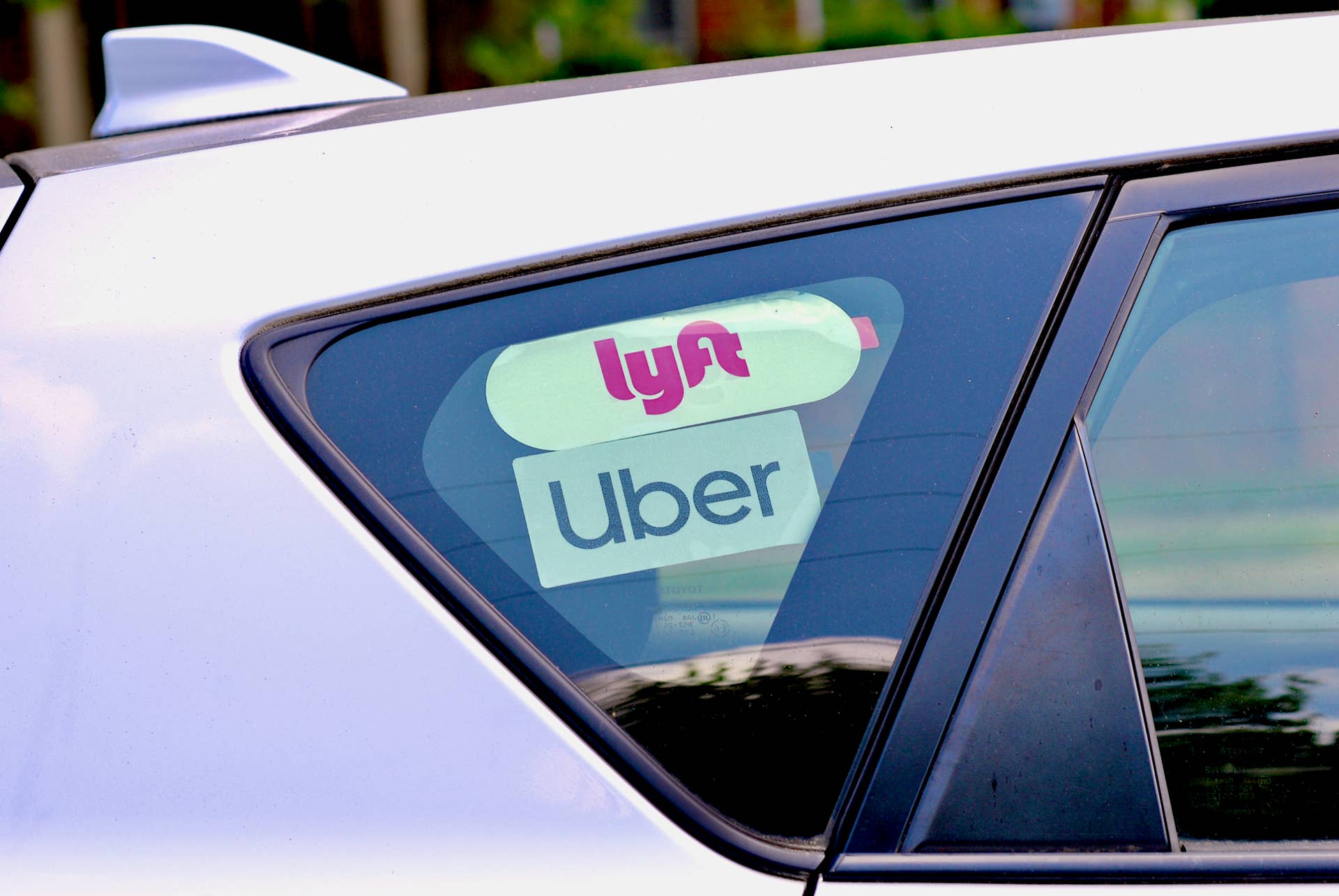 Lyft and Uber window stickers