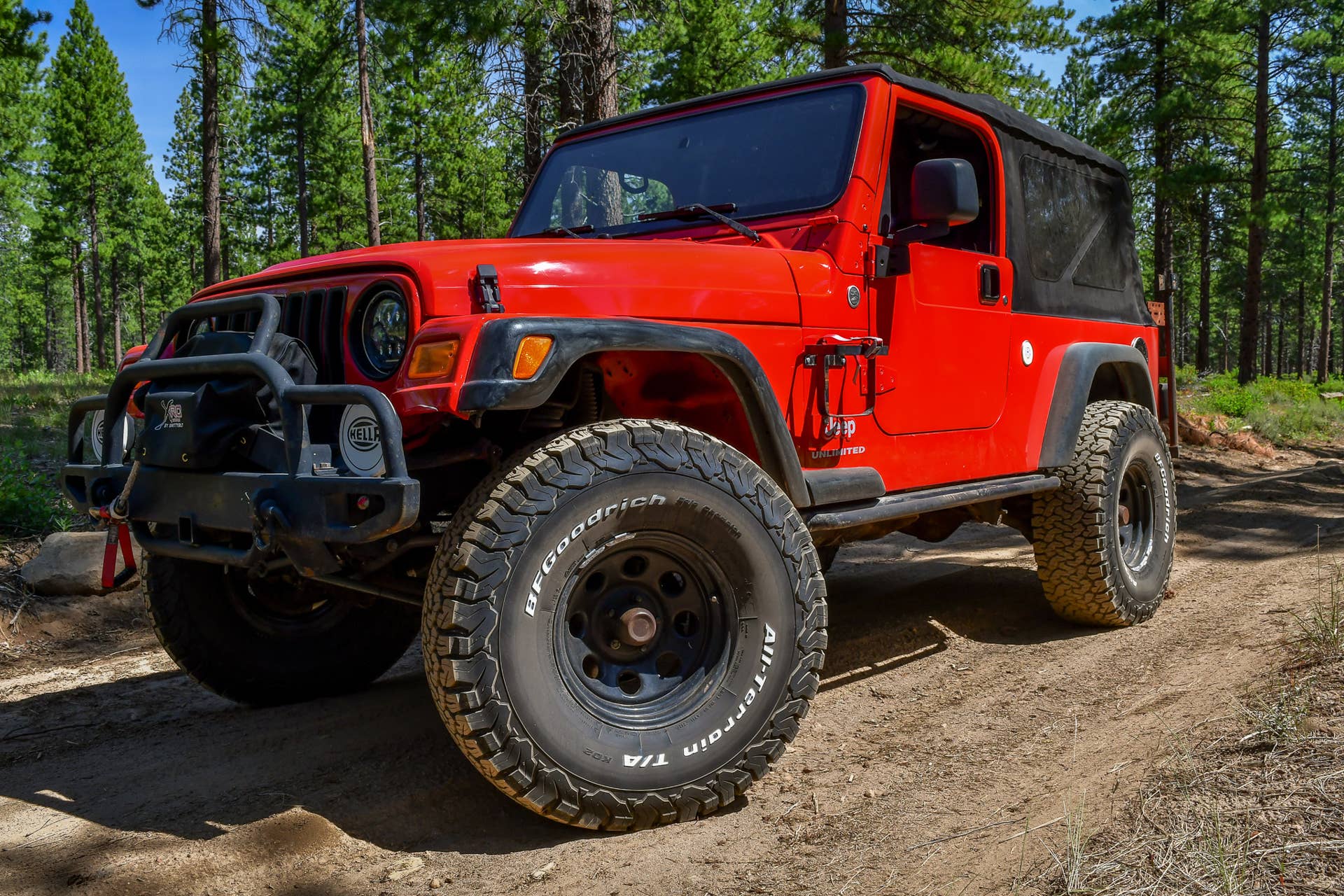 The front end of my 2006 Jeep Wrangler LJ with BFGoodrich KO2 tires