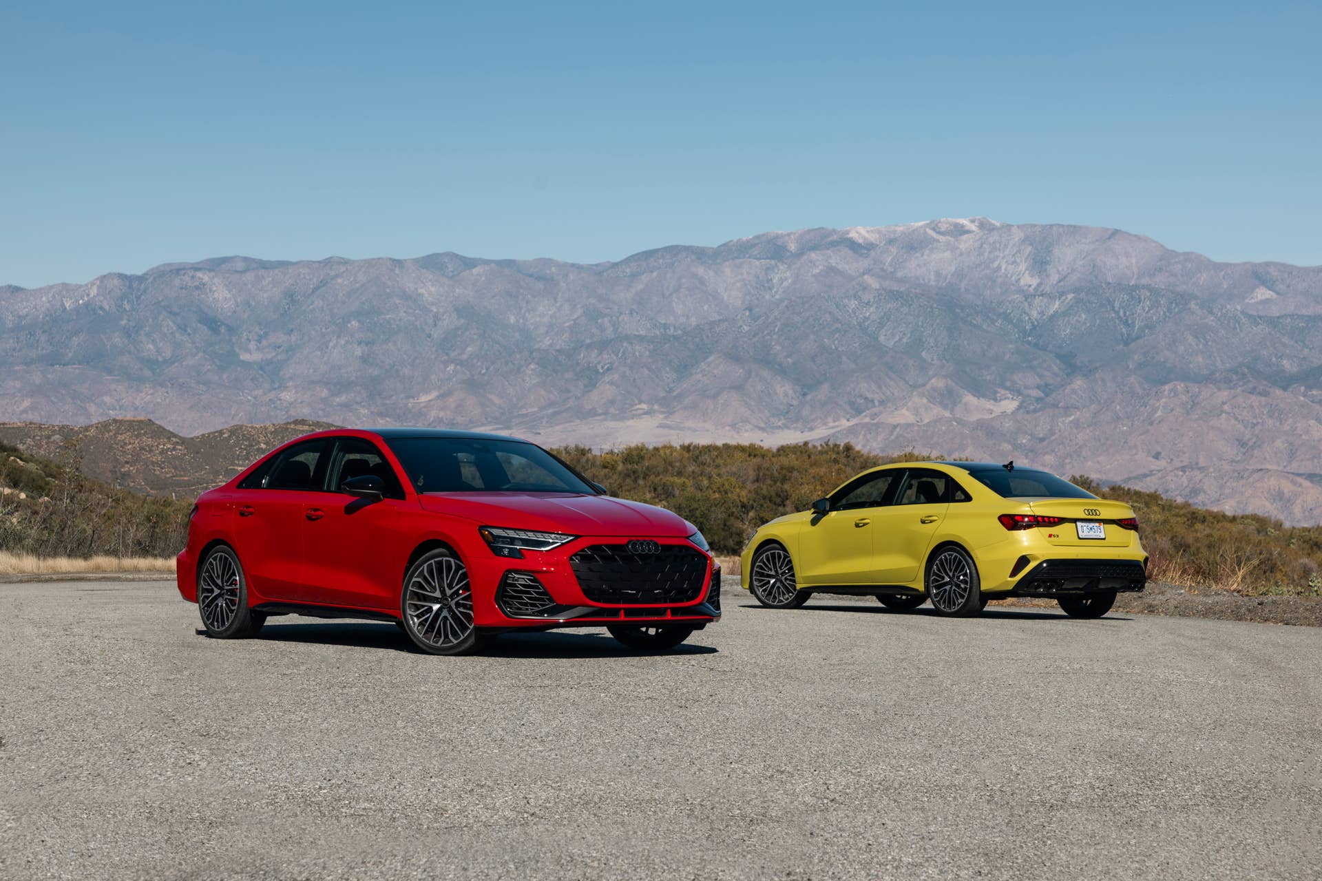 2026 Audi S3 in Progressive Red front and Python Yellow rear
