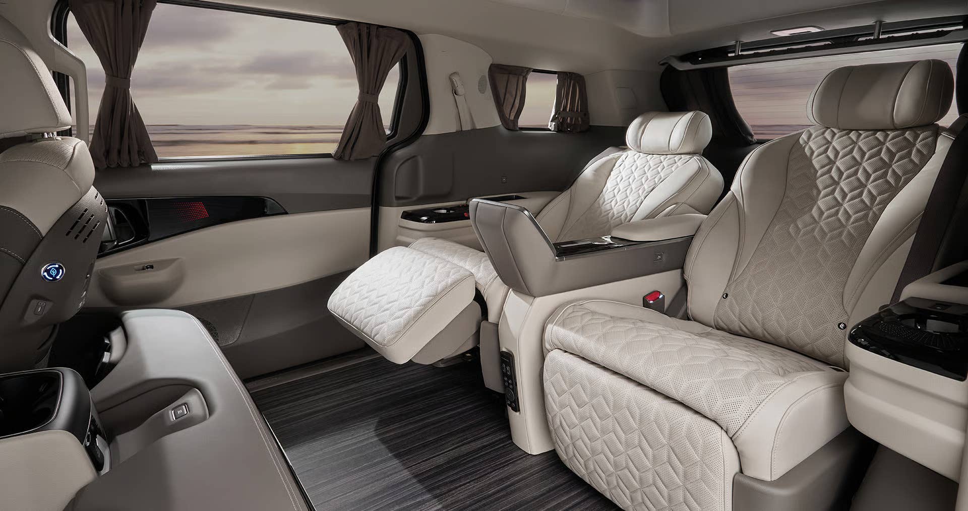 Rear cabin shot of the Carnival Hi Limousine with a built-in refrigerator and cooling cup holders visible.