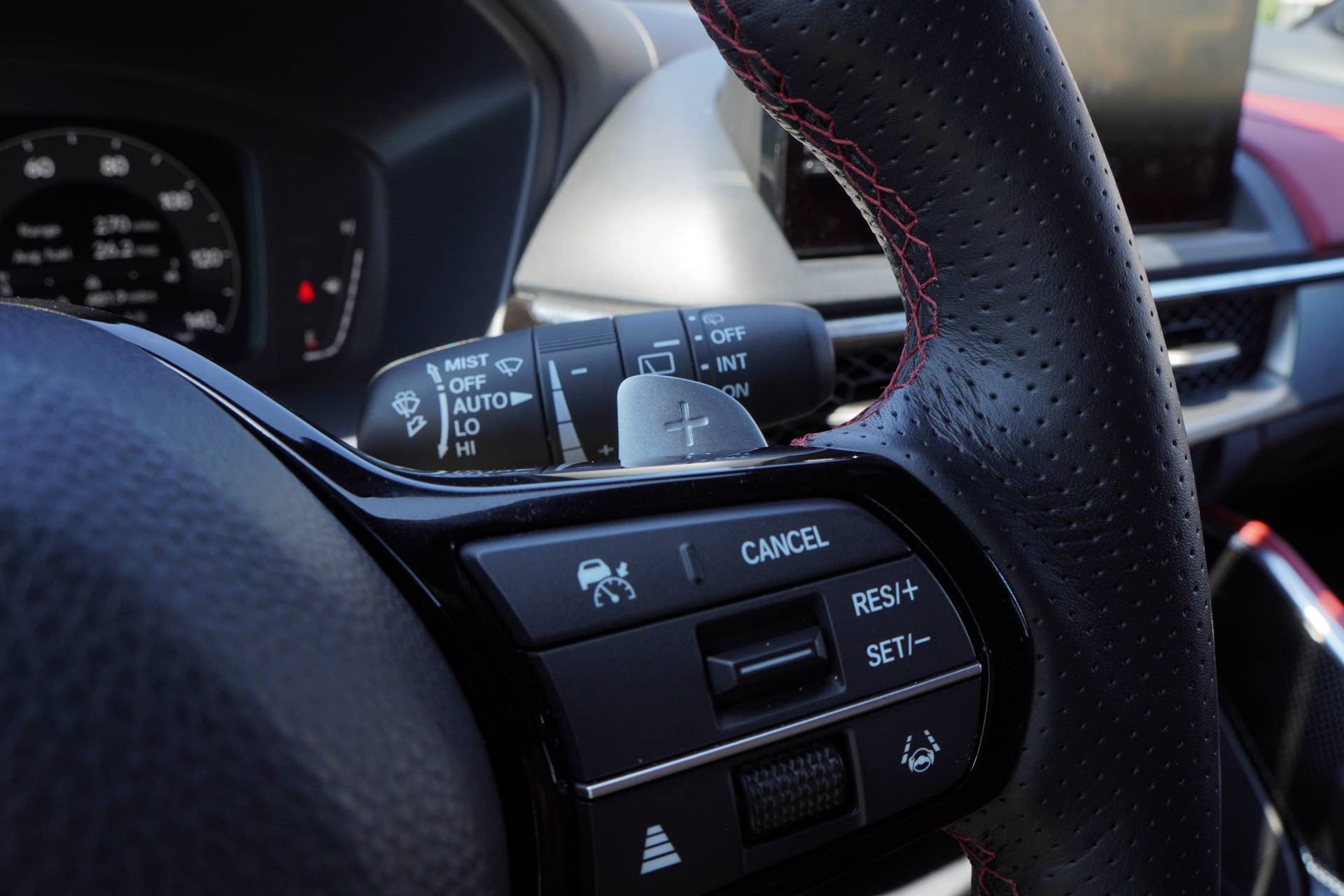 A close-up of a paddle shifter on the 2025 Acura ADX A-Spec with Advance Package
