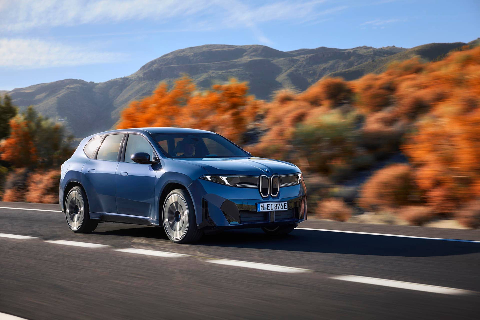 BMW iX3 - front 3-4 driving