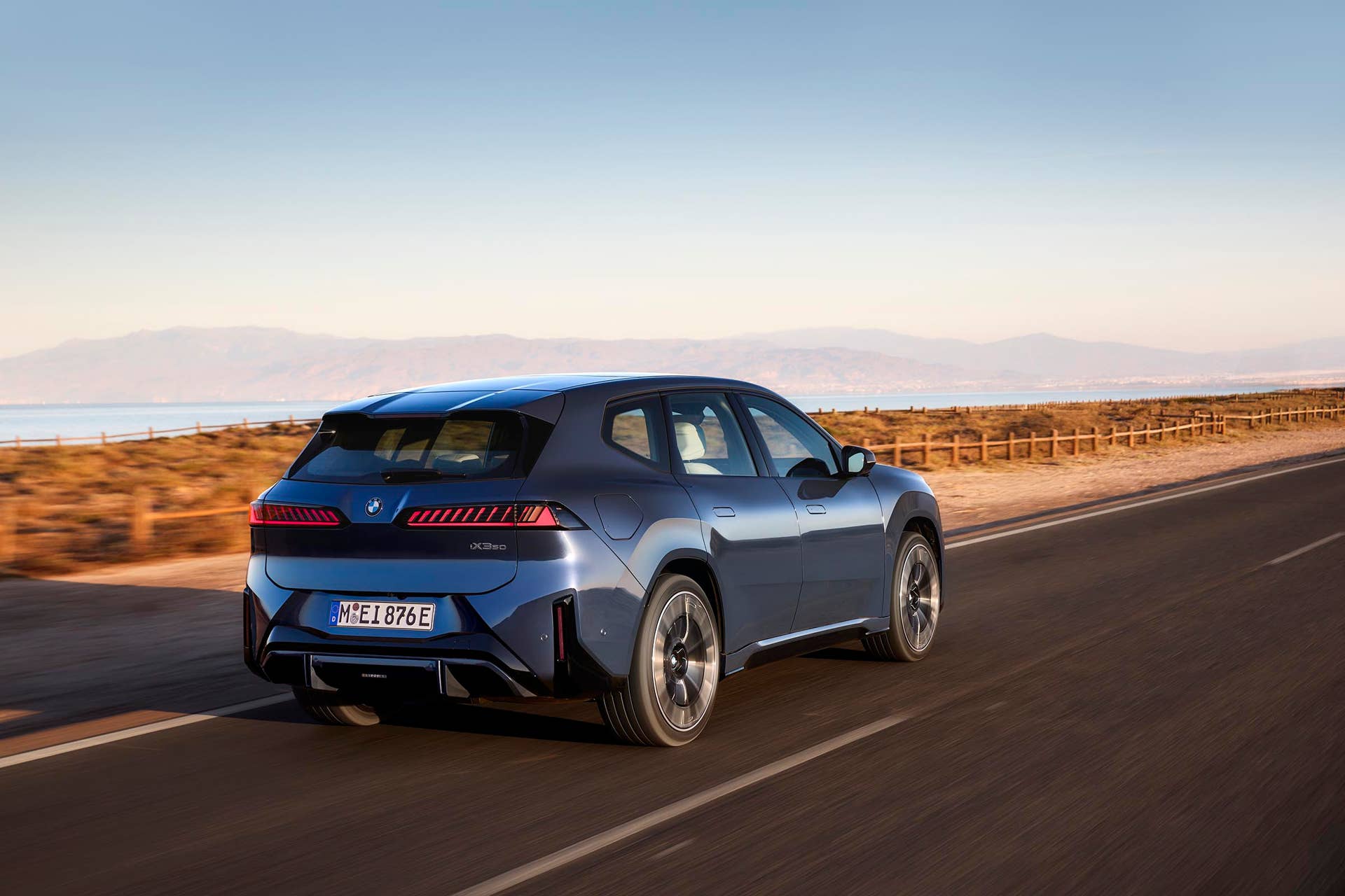 BMW iX3 - rear 3-4 driving