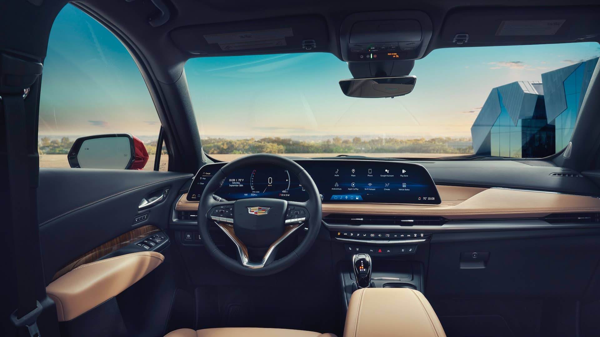 Front-facing view of the 2025 Cadillac XT4 interior showing the 33-inch-diagonal interface and display with 9k resolution.