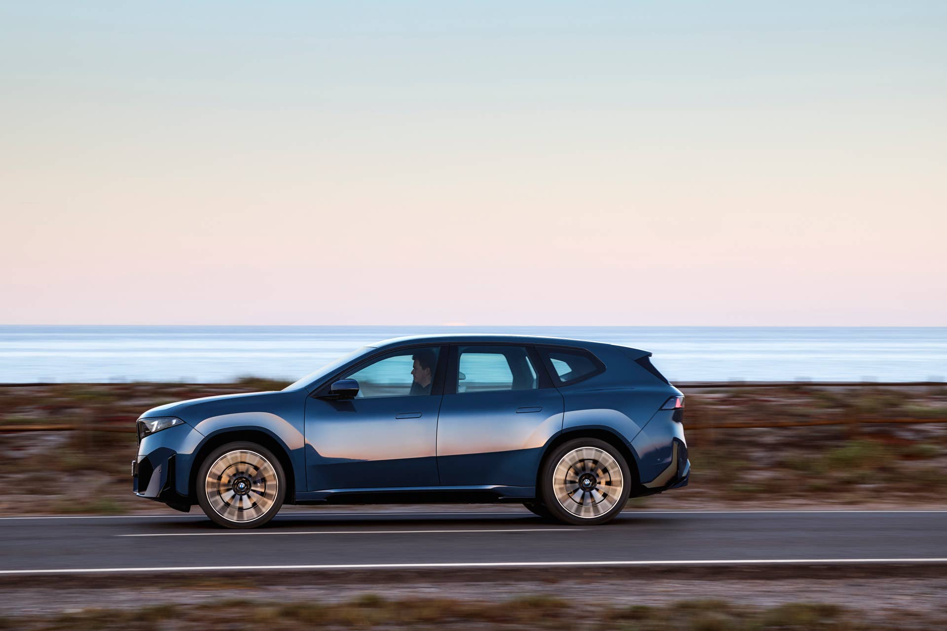 BMW iX3 - side profile driving