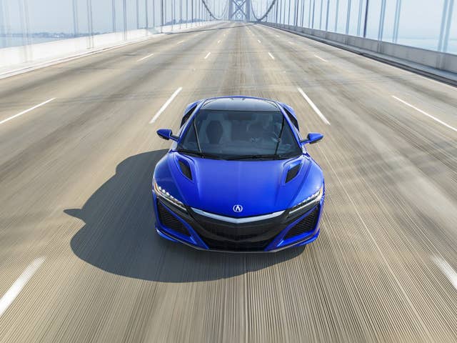 Acura NSX front view driving on bridge