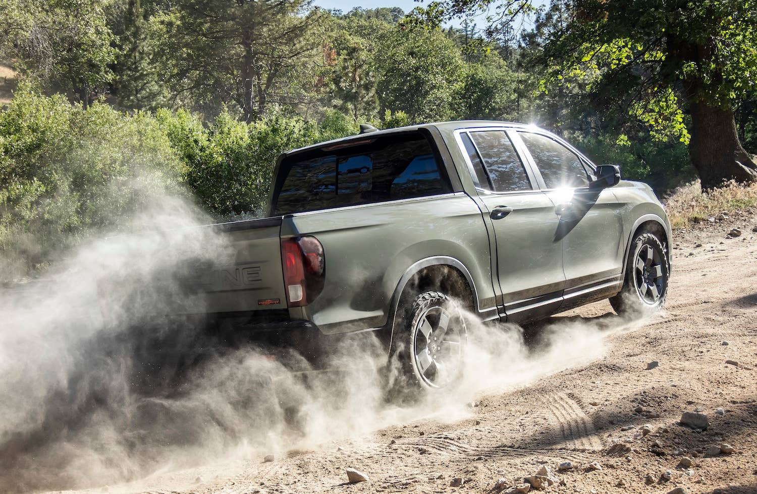 2026 Honda Ridgeline TrailSport rear quarter in action