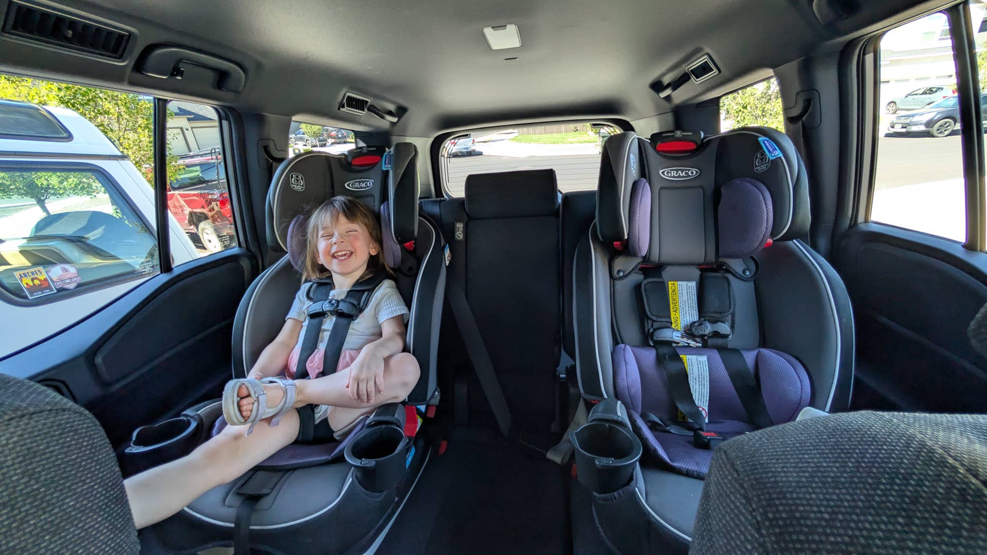 My toddler sitting in the backseat of the 2025 Toyota Land Cruiser 1958