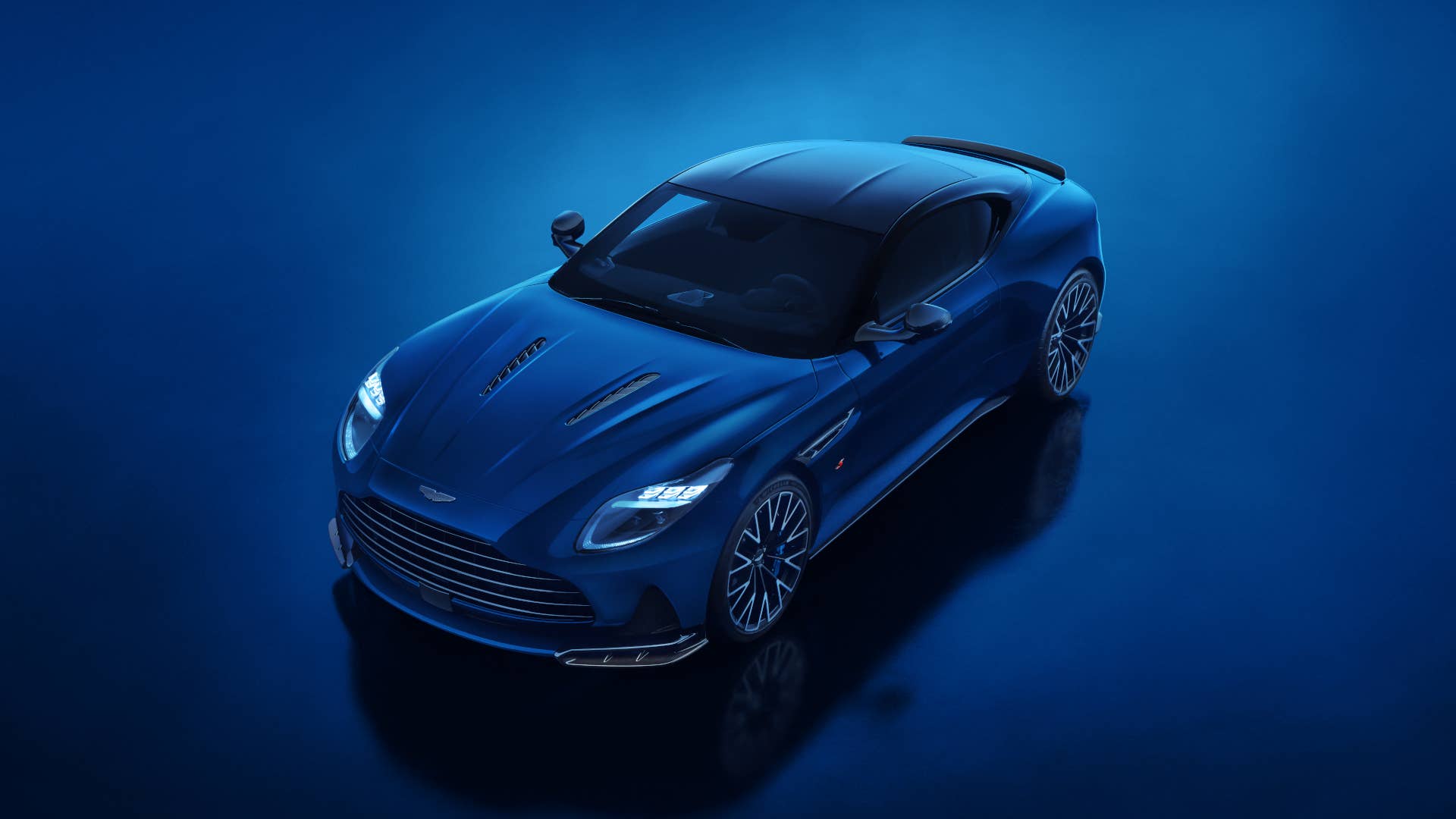 2026 Aston Martin DB12 S Coupe in blue overhead front angled view