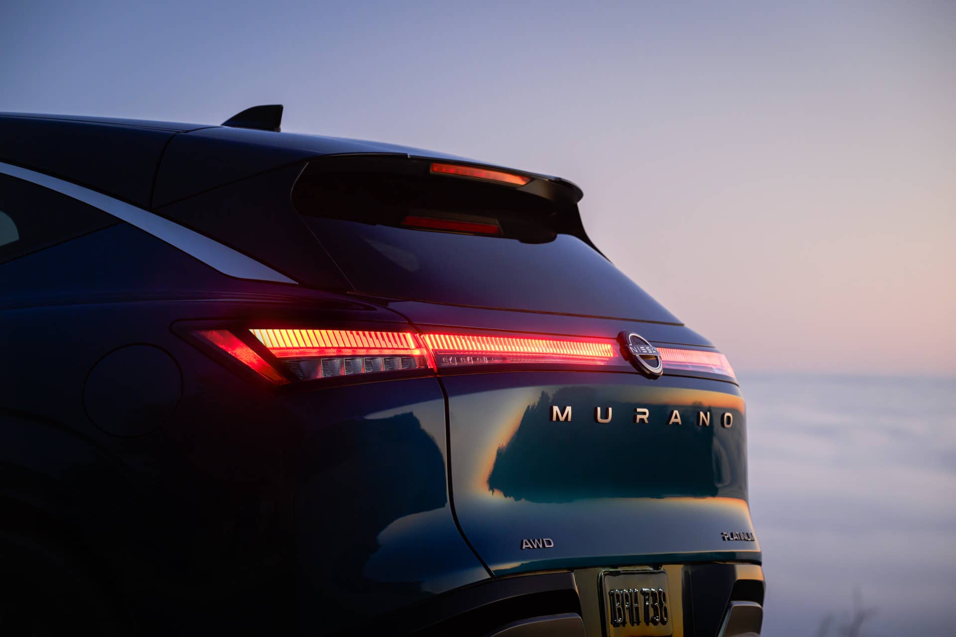 2025-2026 Nissan Murano Platinum in Aurora Blue Pearl rear end closeup