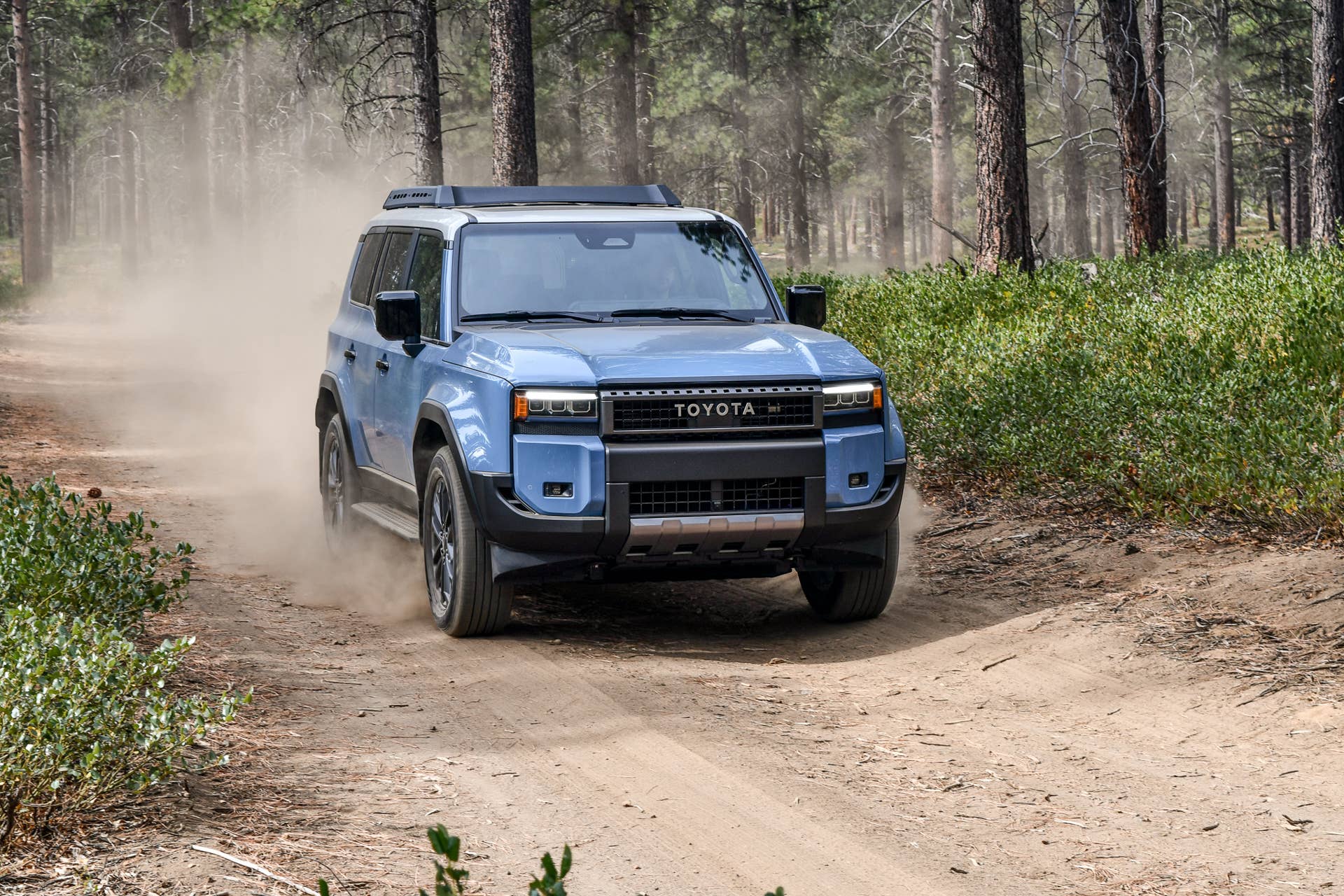 The front of the 2025 Land Cruiser First Edition while driving off-road