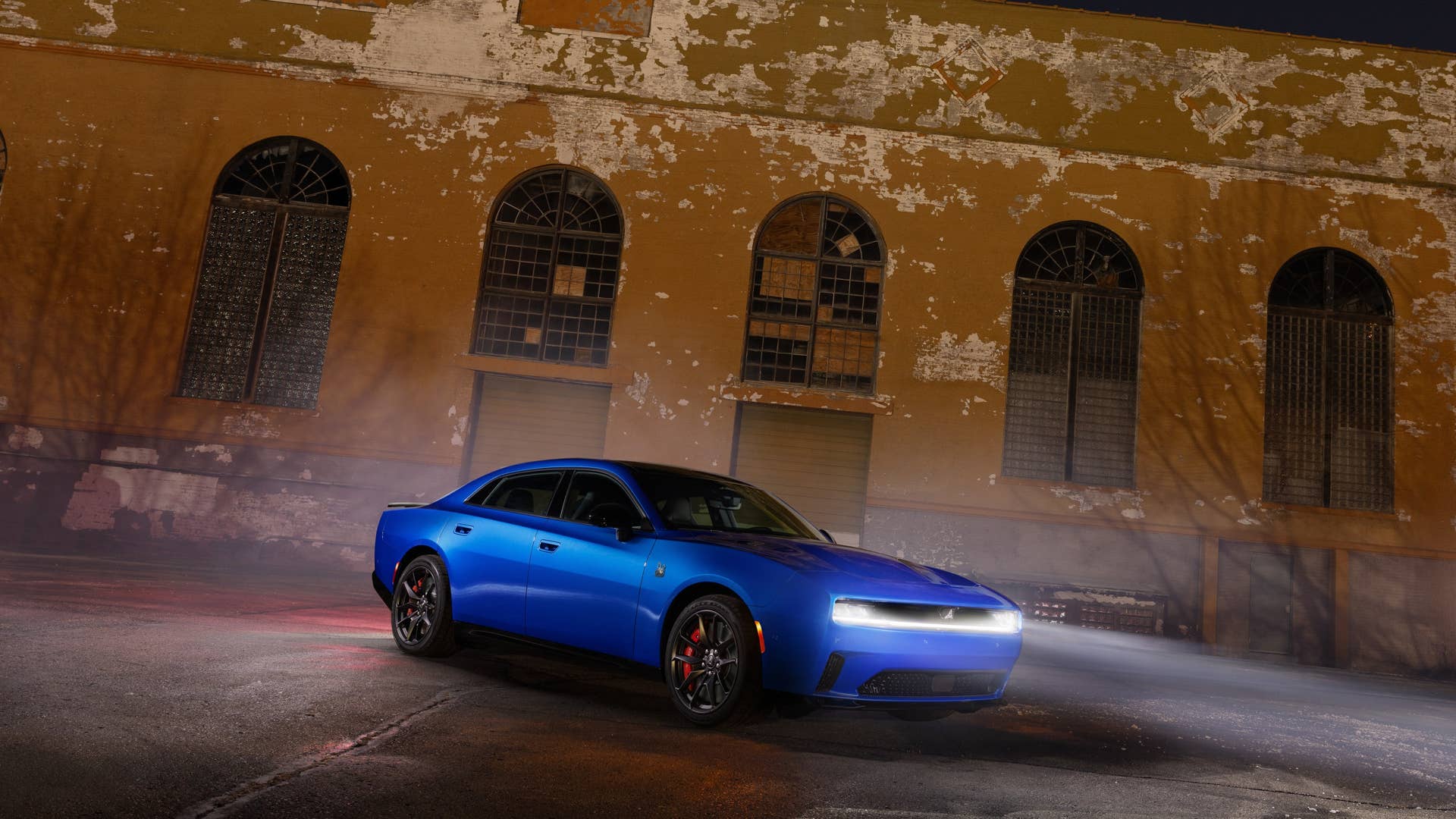 2026 Dodge Charger Daytona Scat Pack Plus 4-door blue front angled view