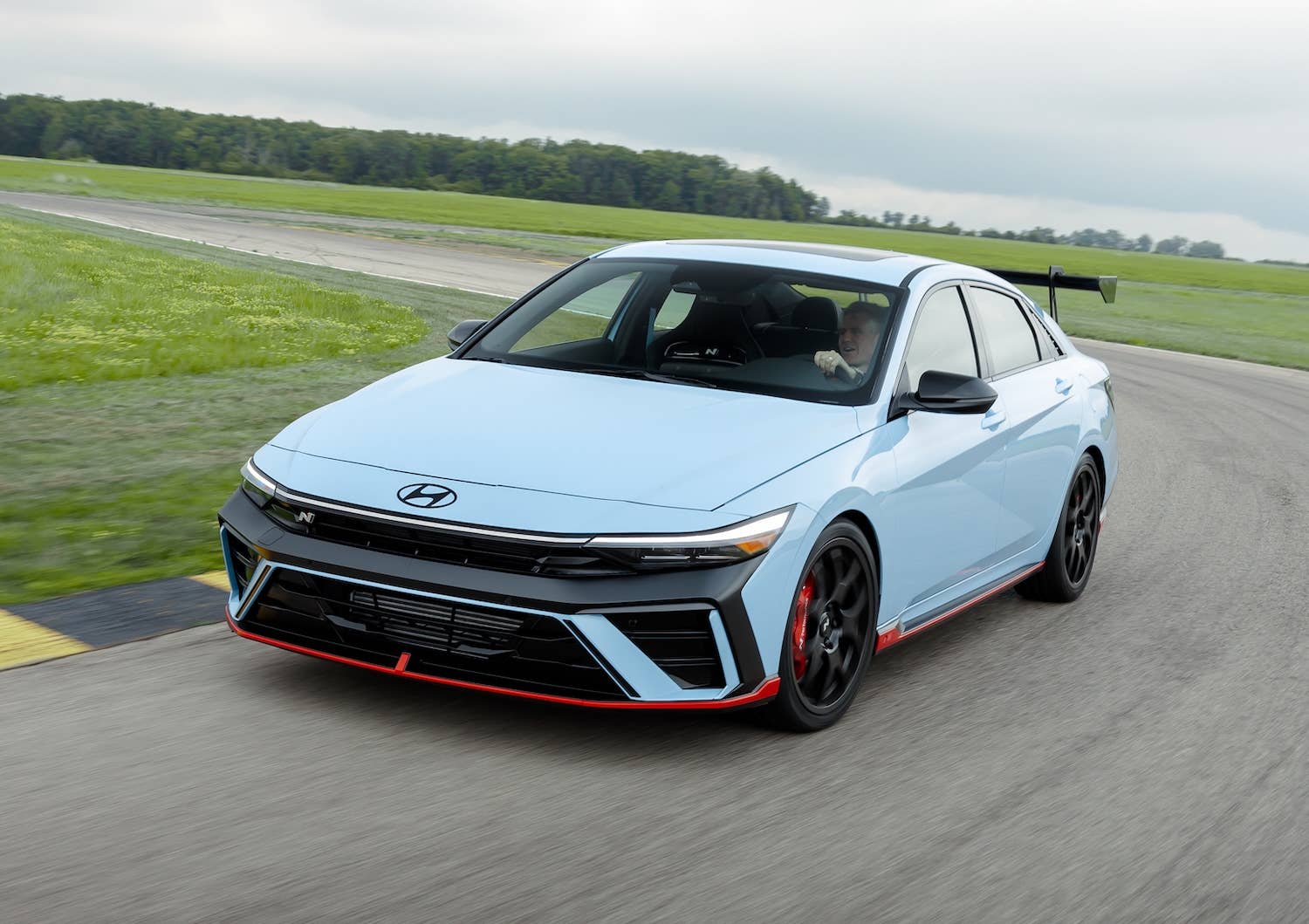 Hyundai Elantra N TCR Edition front quarter on track dynamic