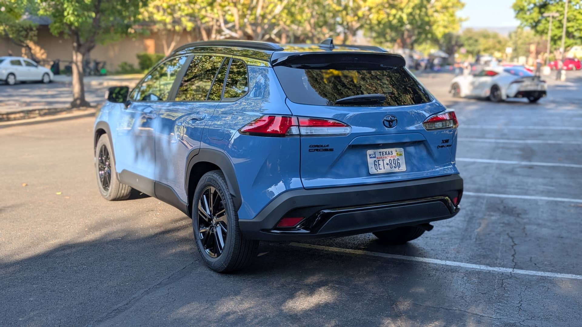 The rear quarter end of the 2025 Toyota Corolla Cross Hybrid