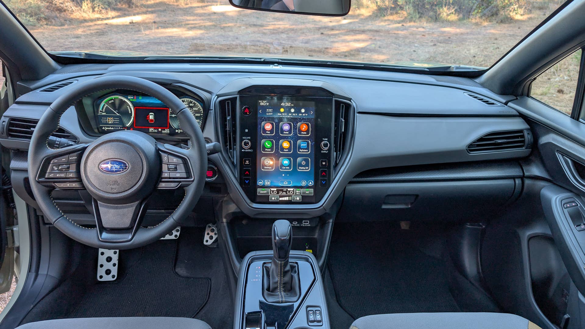 The driver control center of the 2026 Subaru Crosstrek Sport Hybrid