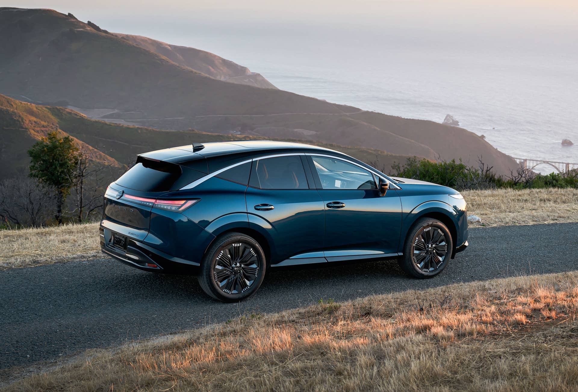 2026 Nissan Murano Platinum in Aurora Blue Pearl rear angled view