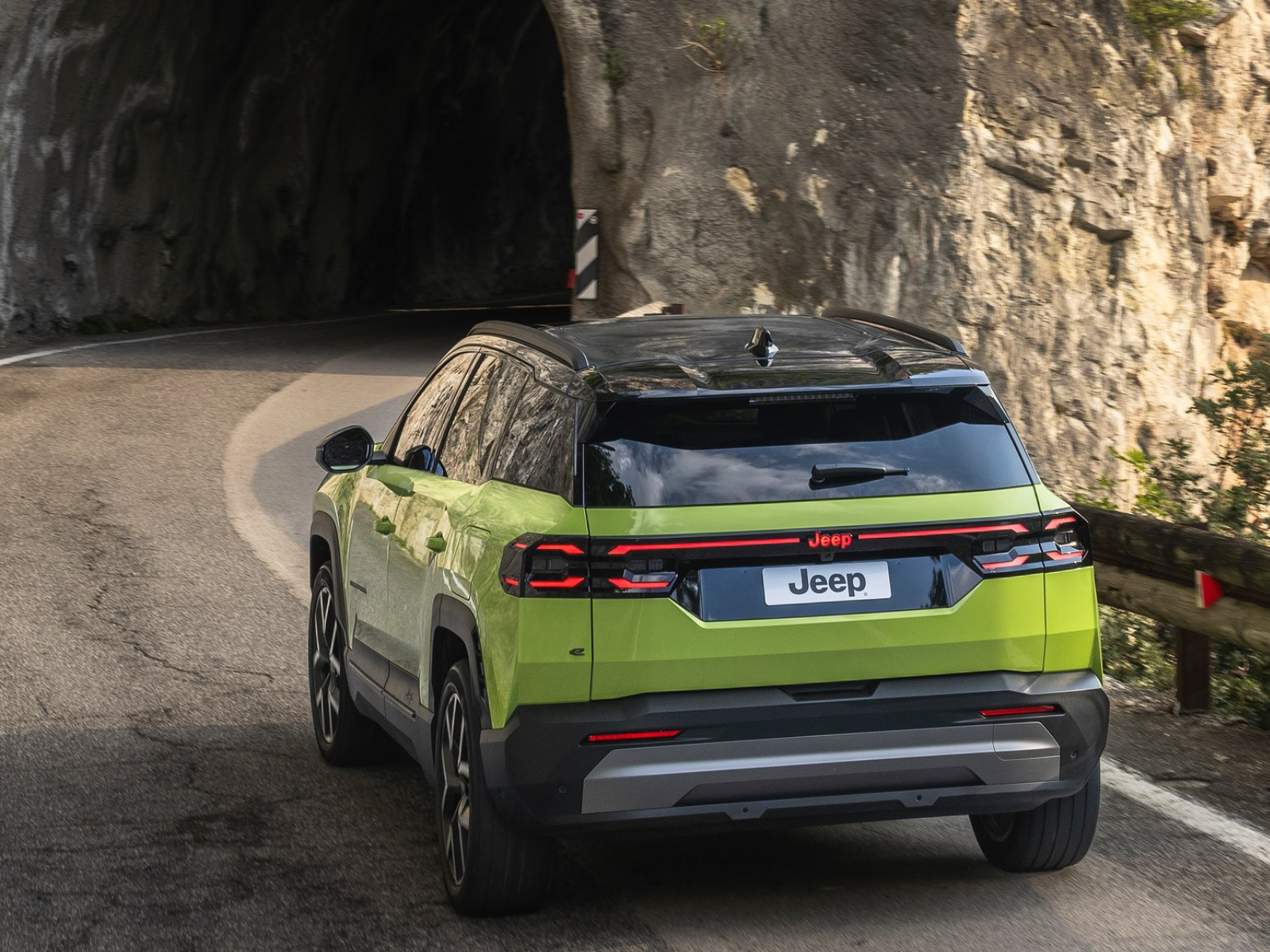 2026 Jeep Compass First Edition lime rear view driving
