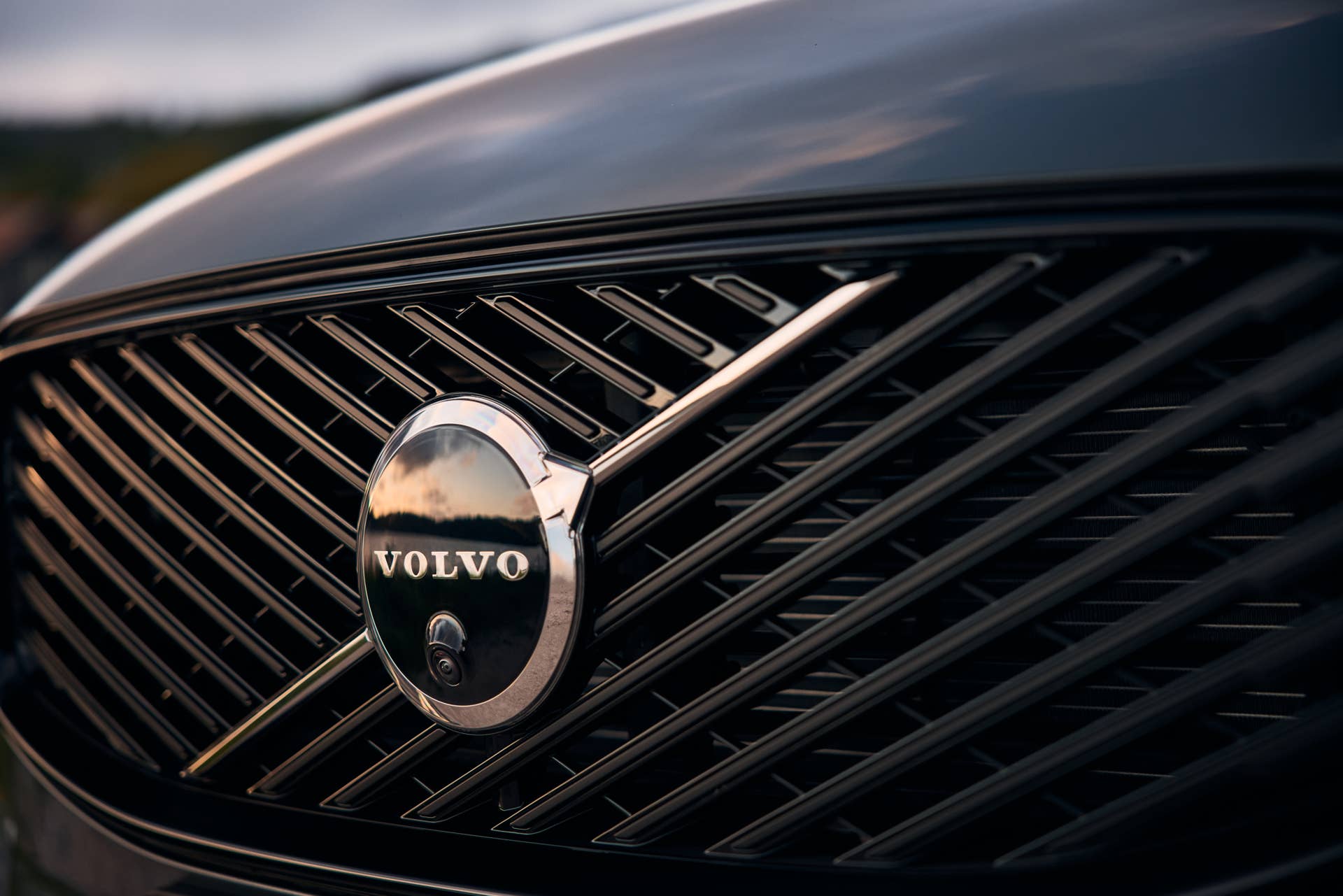 Volvo logo on the front grille of the 2026 XC60 crossover SUV